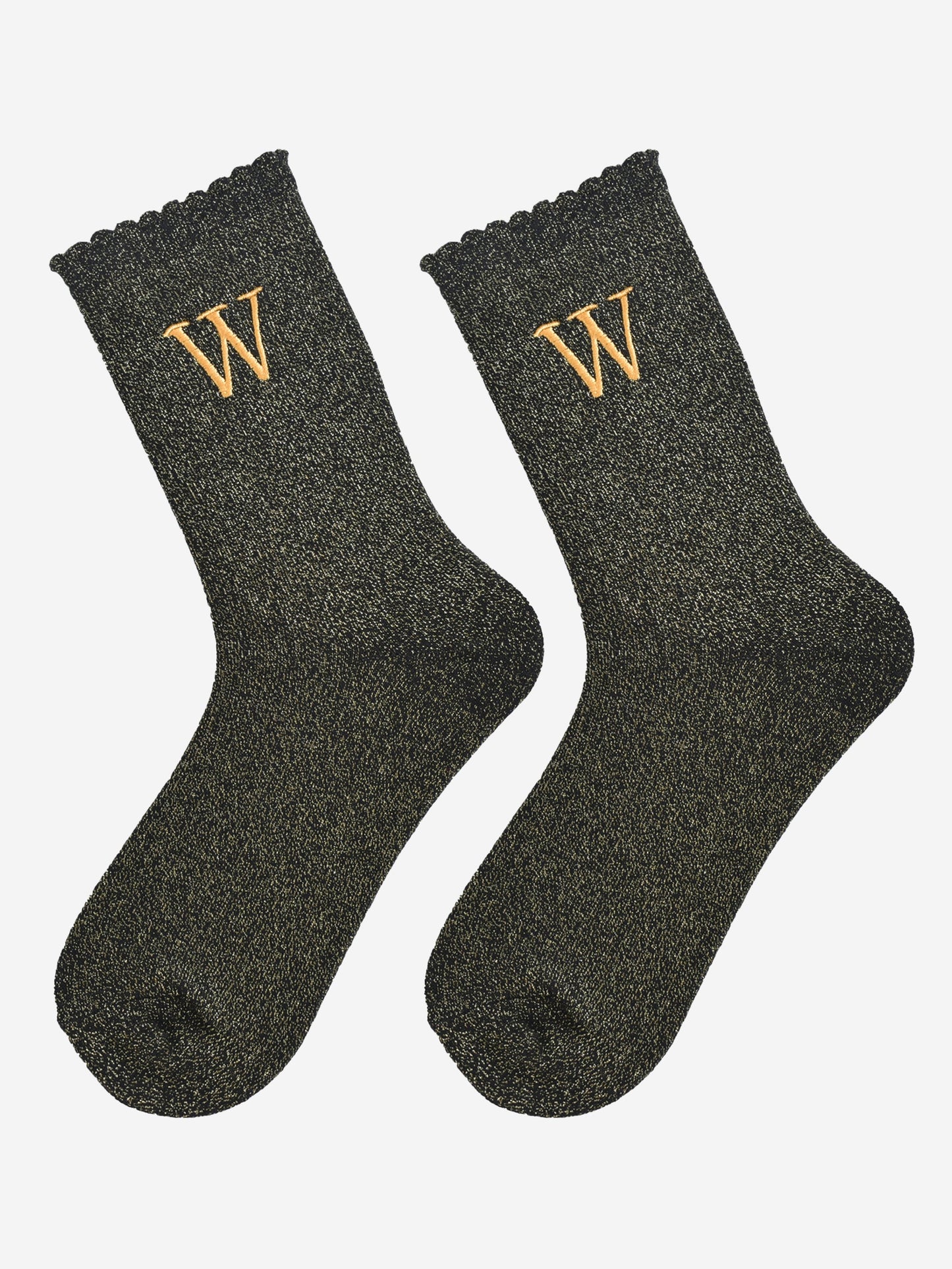 showing the glitter socks laying flat, they have a scalloped cuff and an all over gold sparkle