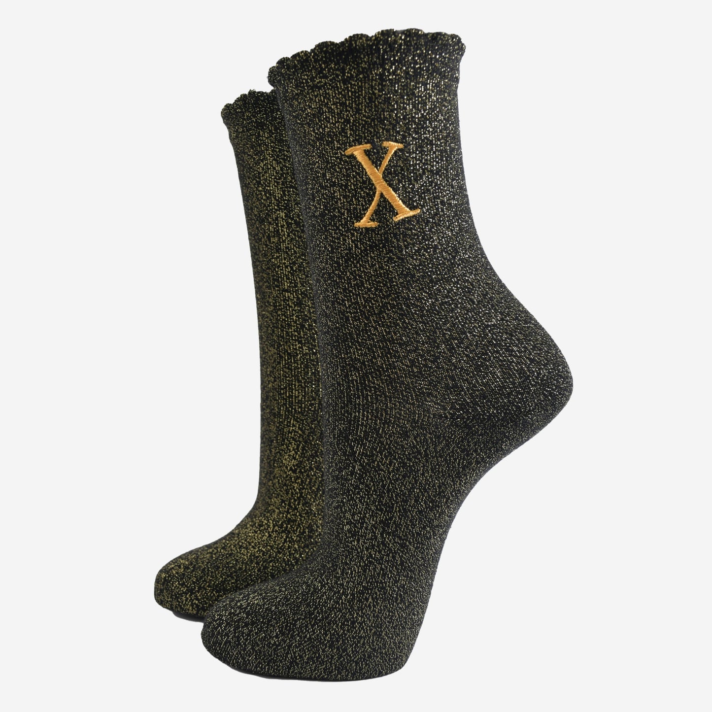 black ankle socks with a scalloped cuff, with an all over gold glitter sparkle and an embroidered gold letter x on the ankle