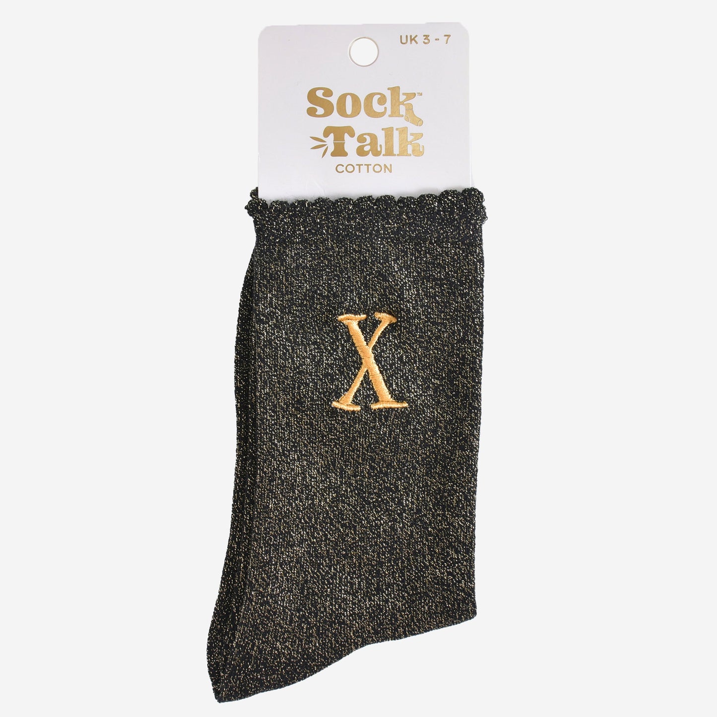 embroidered glitter letter x cotton ankle socks in their sock talk packaging, the socks are a uk size 3-7