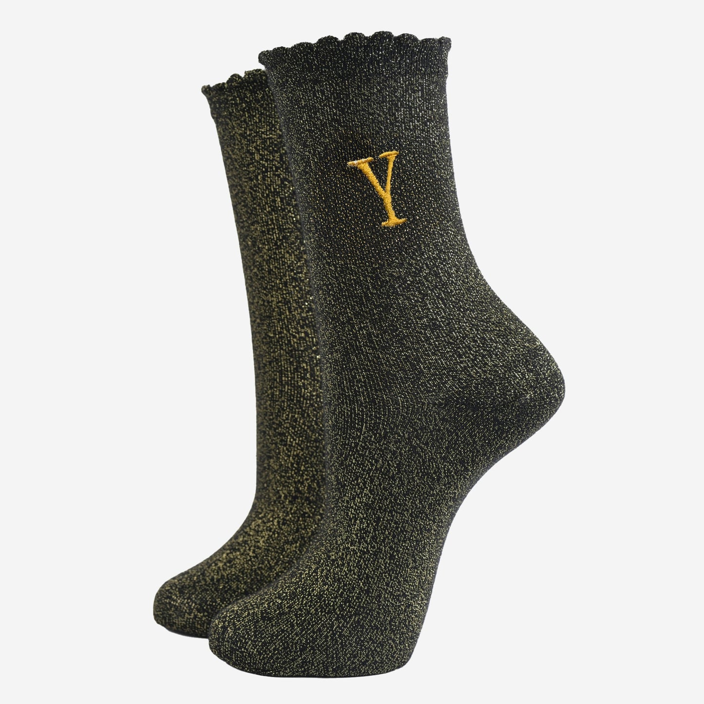 black ankle socks with a scalloped cuff, with an all over gold glitter sparkle and an embroidered gold letter y on the ankle