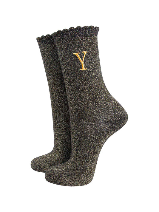 black ankle socks with a scalloped cuff, with an all over gold glitter sparkle and an embroidered gold letter y on the ankle