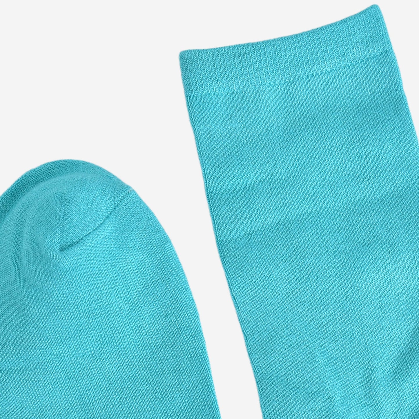 showing the toe and cuff of the turquoise bamboo socks, they are the same solid colour as the body of the socks