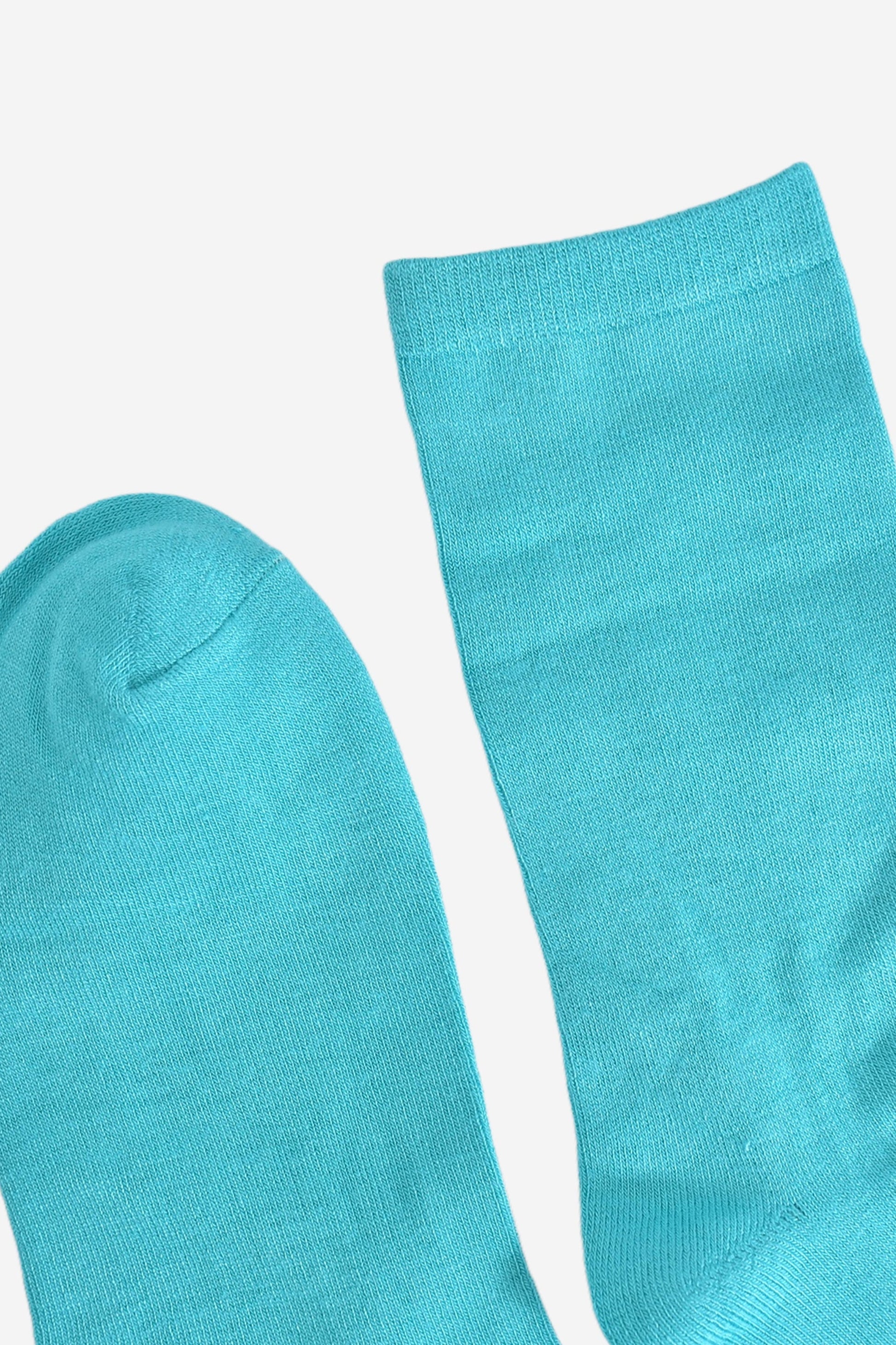 showing the toe and cuff of the turquoise bamboo socks, they are the same solid colour as the body of the socks