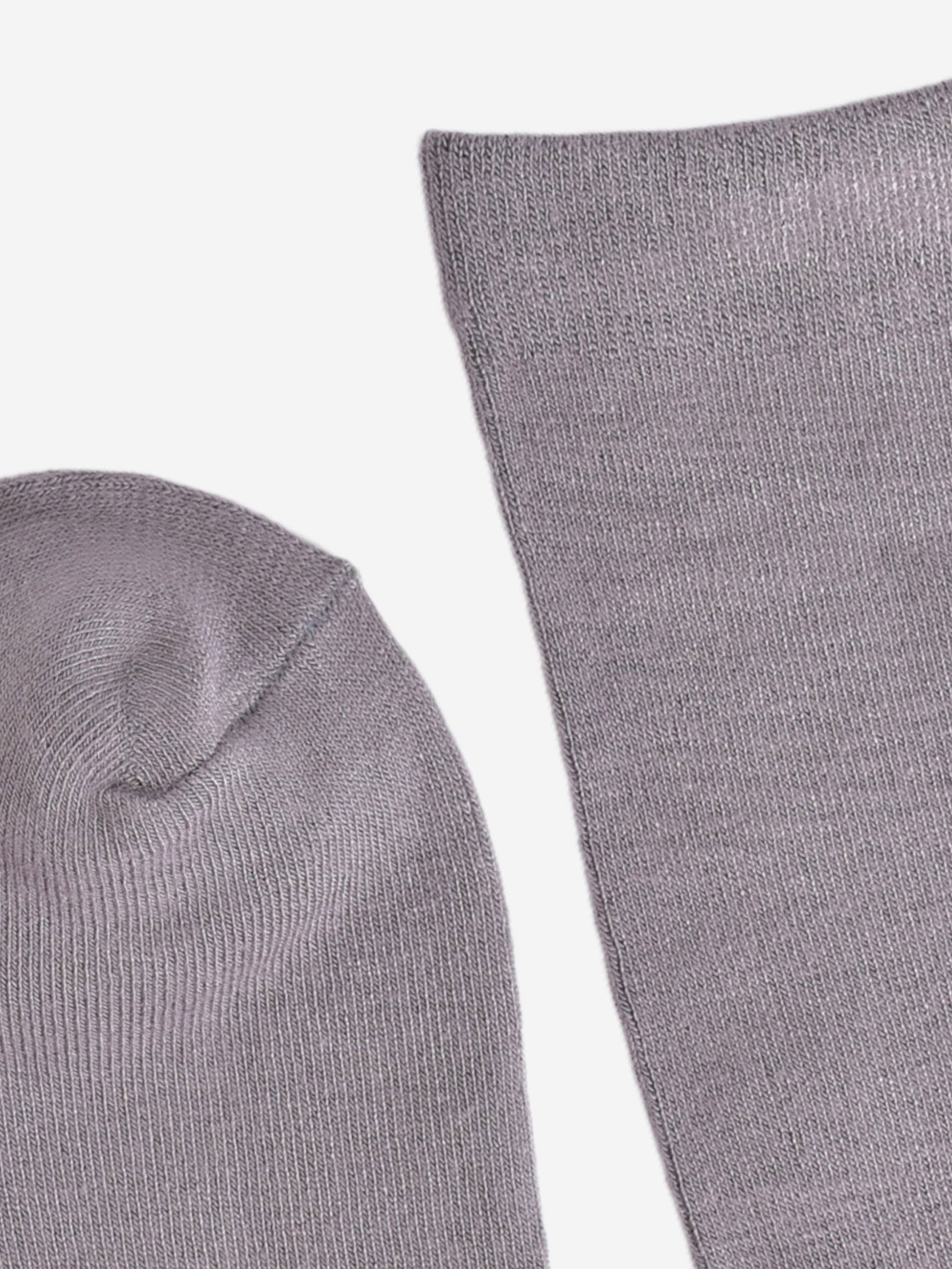 close up of the toe and cuff of the socks, they are the same colour as the body of the socks