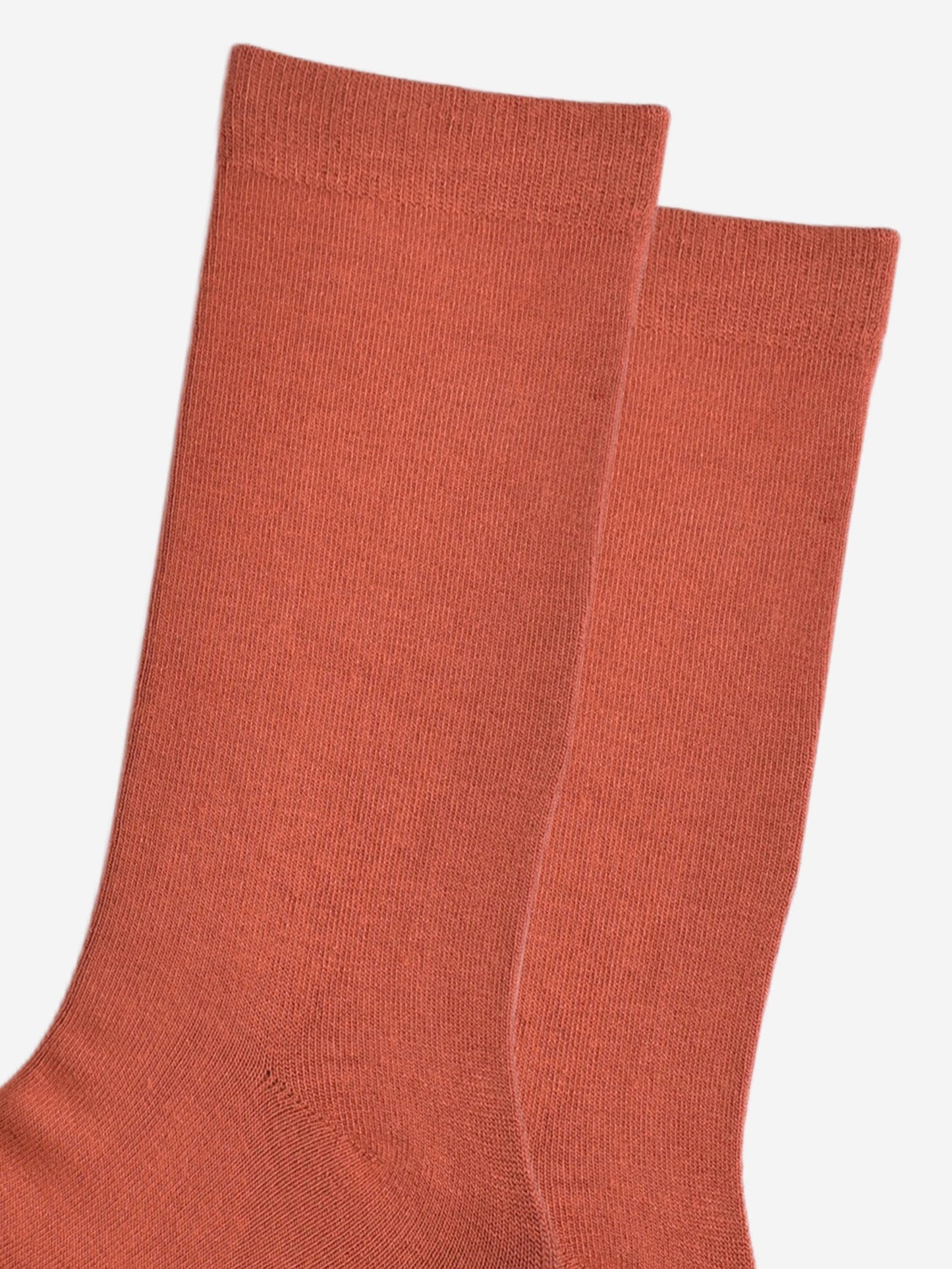 close up of the plain rust orange socks