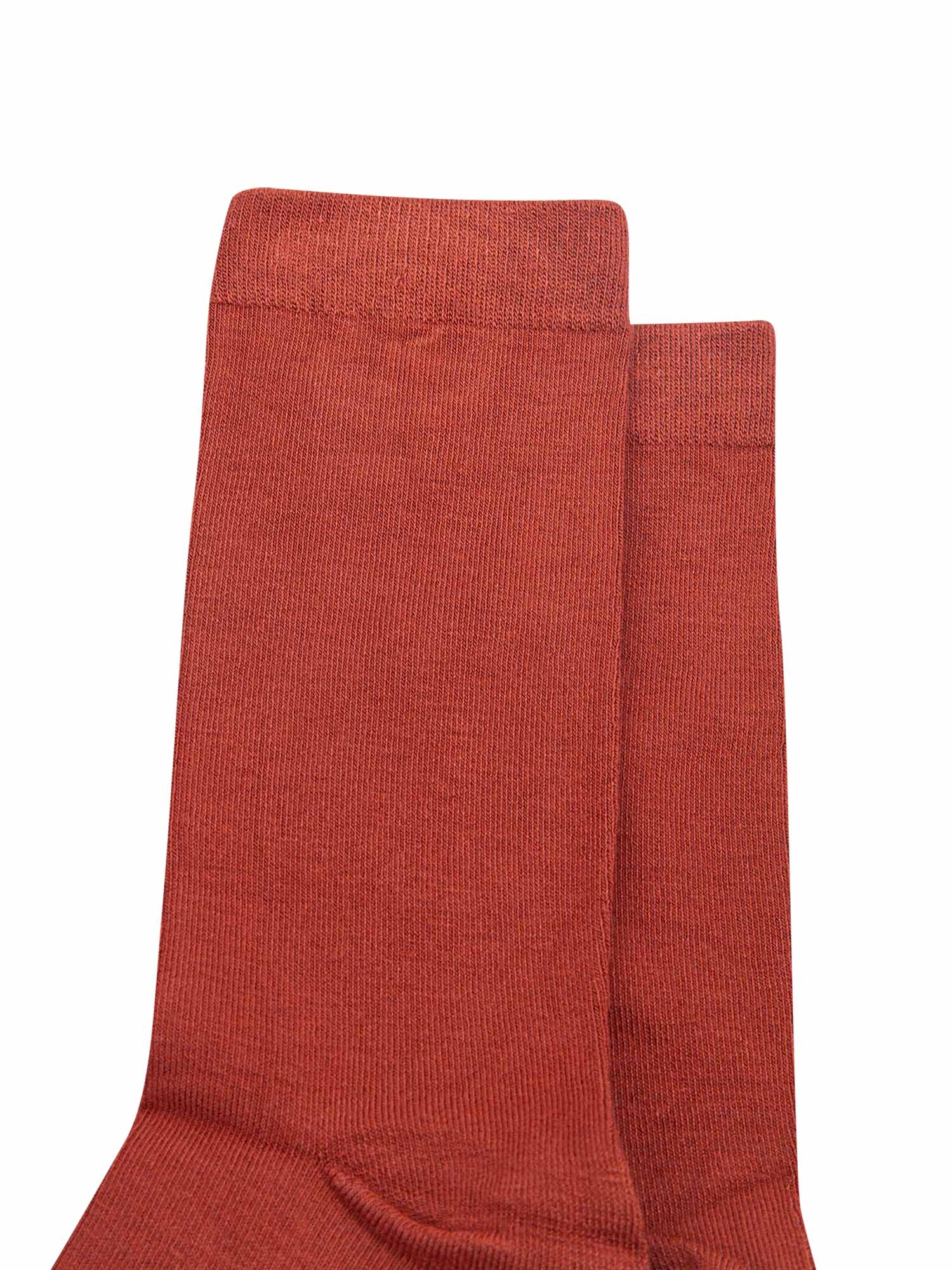 close up of the plain rust orange socks