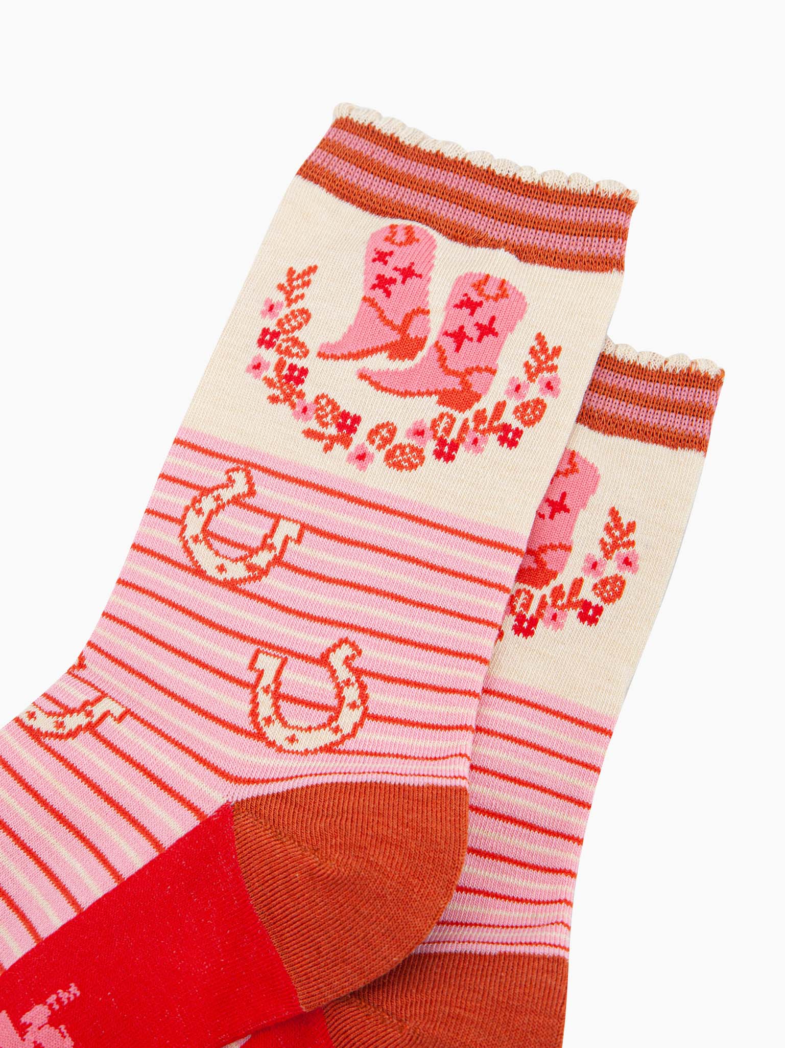 womens-bamboo-socks-cream-pink-cowboy-boot-stripe-close-up-pink-cowgirl-boots-with-a-semi-circular-floral-wreath-on-the-ankle-frilled-scalloped-cuff