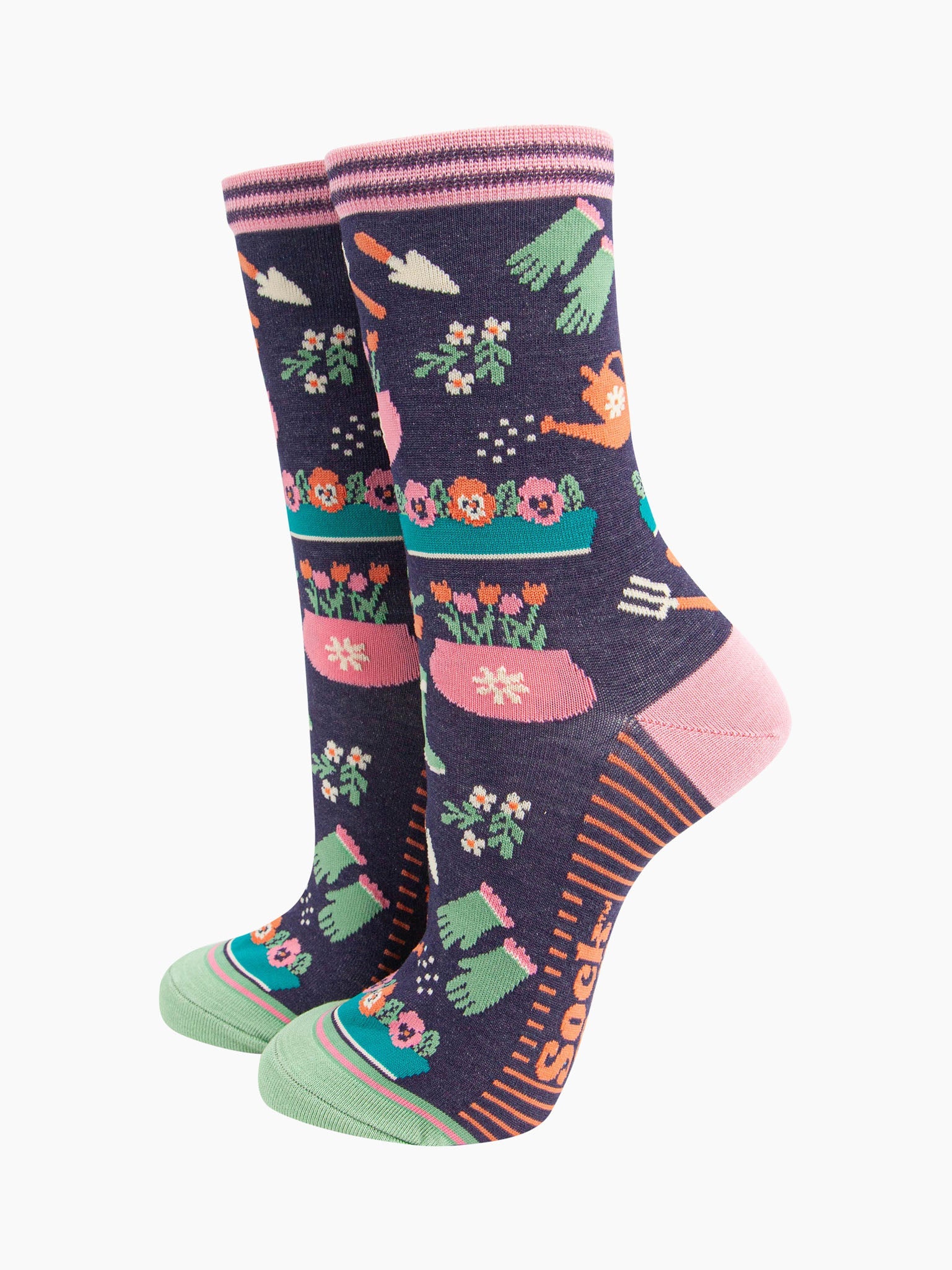 womens-bamboo-socks-navy-gardening-ankle socks-with-a-pattern-of-garden-tools-and-flowers