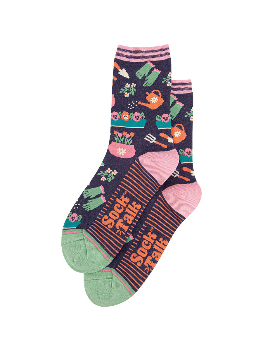 womens-bamboo-socks-navy-gardening-laying-flat-showing-the-pattern-of-garden-tools-and-plant-pots