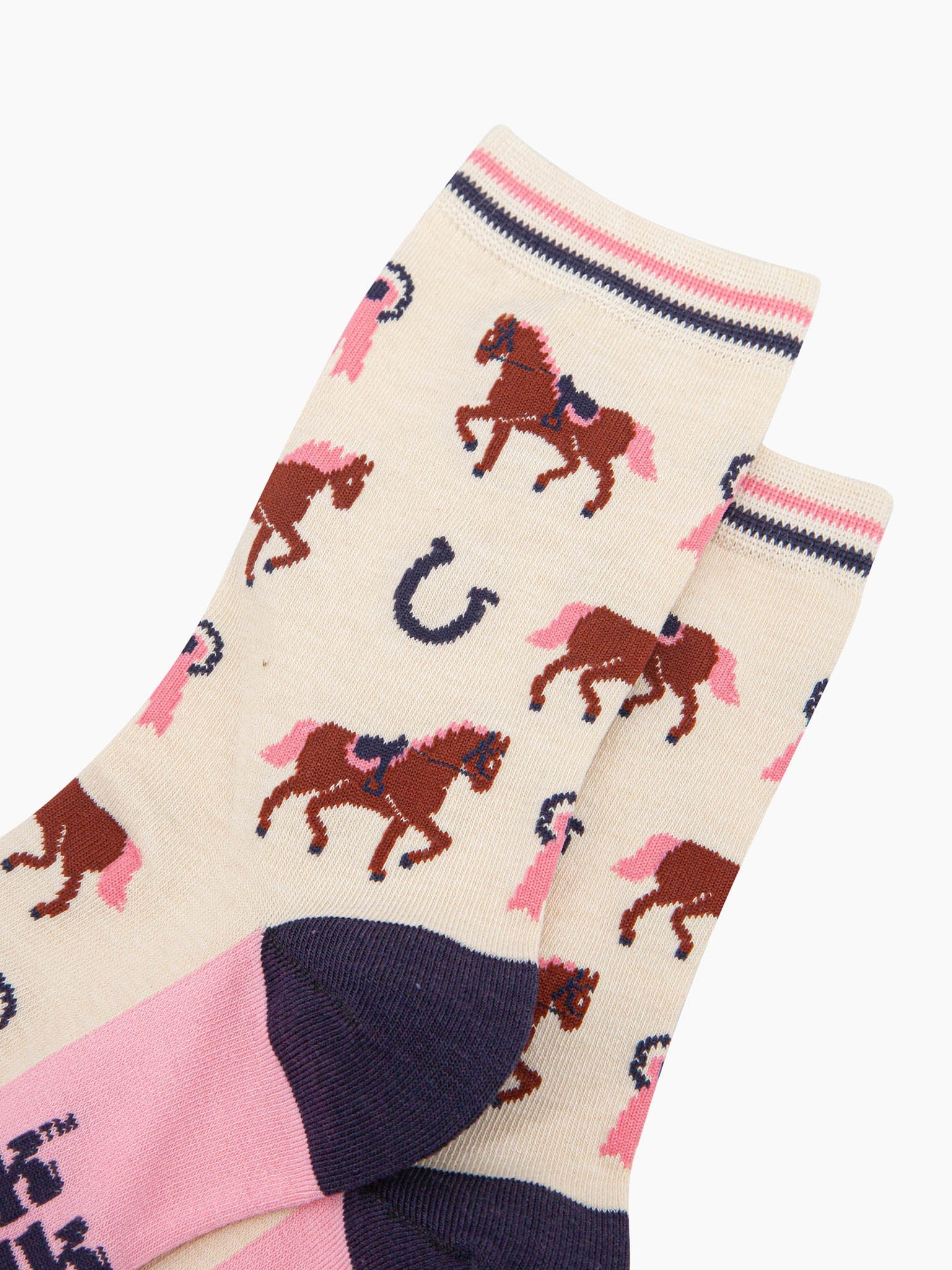 womens-bamboo-socks-cream-horse-riding-close-up-horses-wearing-saddles-and-bridles-pink-eventing-rosettes-large-horseshoes