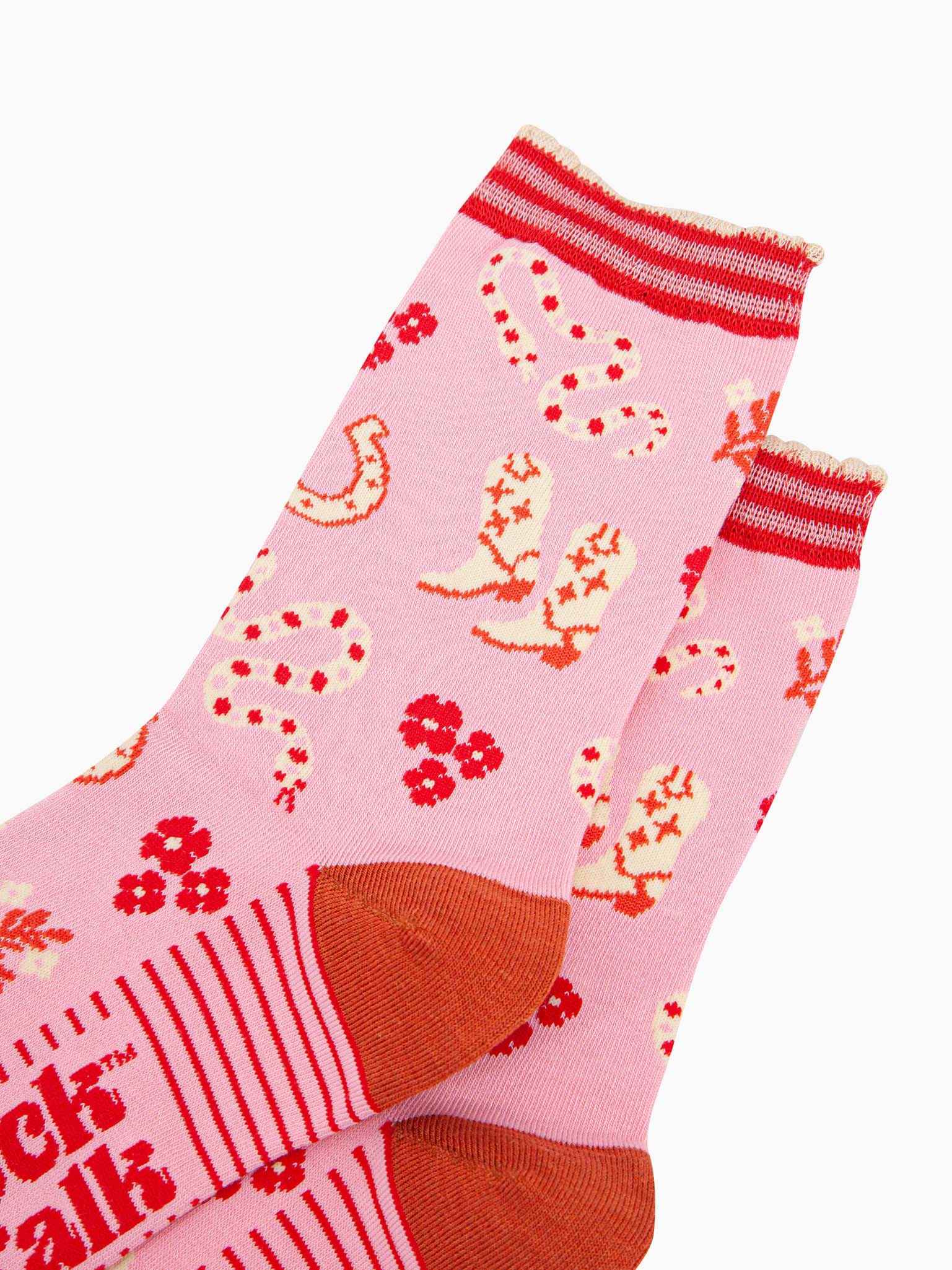 womens-bamboo-socks-pink-western-cowgirl-snakes-close-up-white-cowboy-boots-winding-rattle-snakes-red-desert-flowers-all-on-pink-background