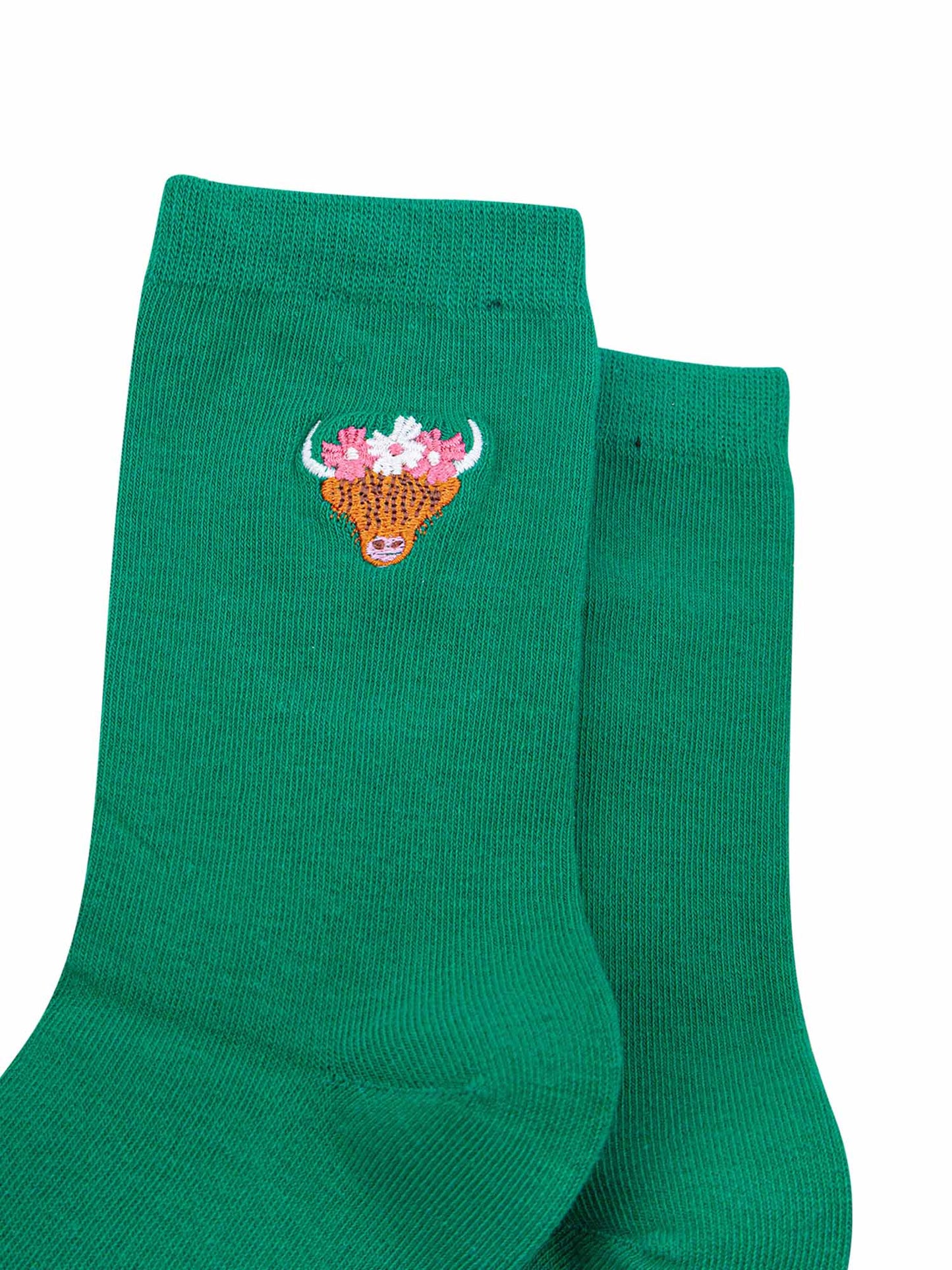 womens-embroidered-socks-green-highland-cow-close-up-coo-wearing-pink-and-white-floral-crown-cow-is-orange-with-long-hair