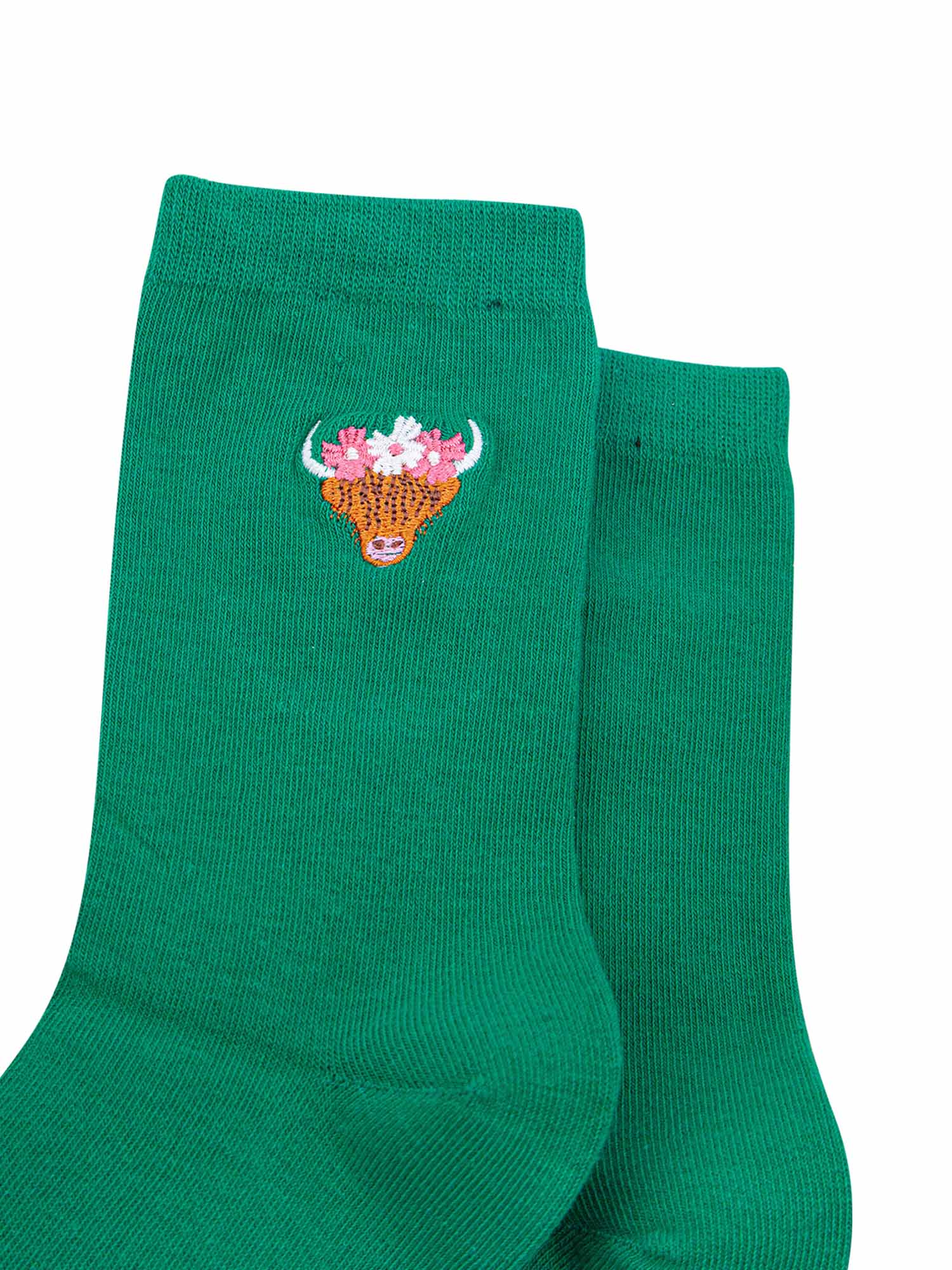 womens-embroidered-socks-green-highland-cow-close-up-coo-wearing-pink-and-white-floral-crown-cow-is-orange-with-long-hair