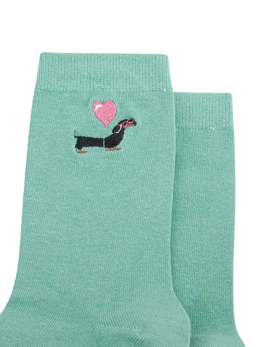 womens-embroidered-socks-mint-sausage-dog-heart-balloon-close-up-black-dachshund-wearing-pink-sunglasses-carrying-pink-balloon