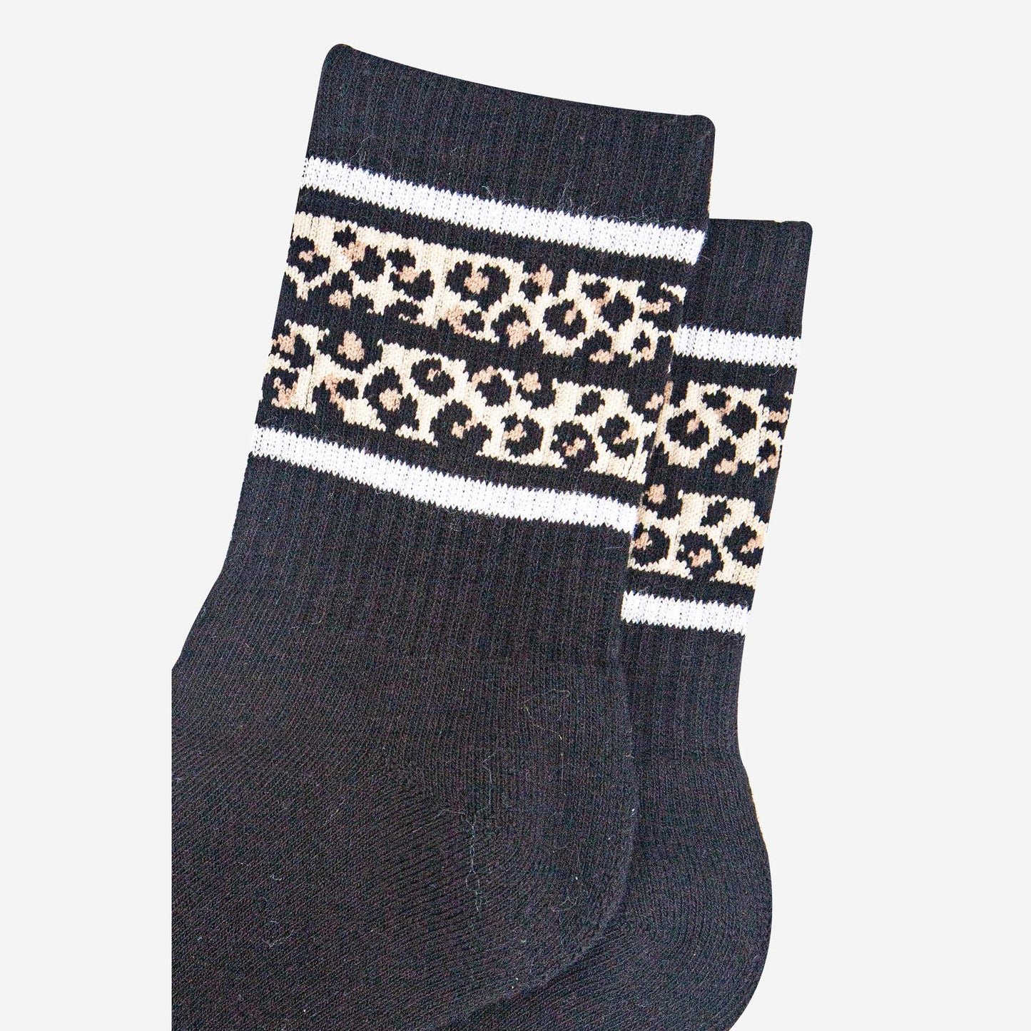 womens-sporty-socks-black-leopard-stripe-close-up-animal-print
