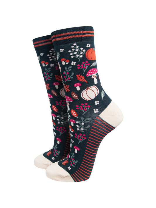 Pumpkin-Floral-Women's-Bamboo-Socks-in-Dark-Green-On-Mannequin