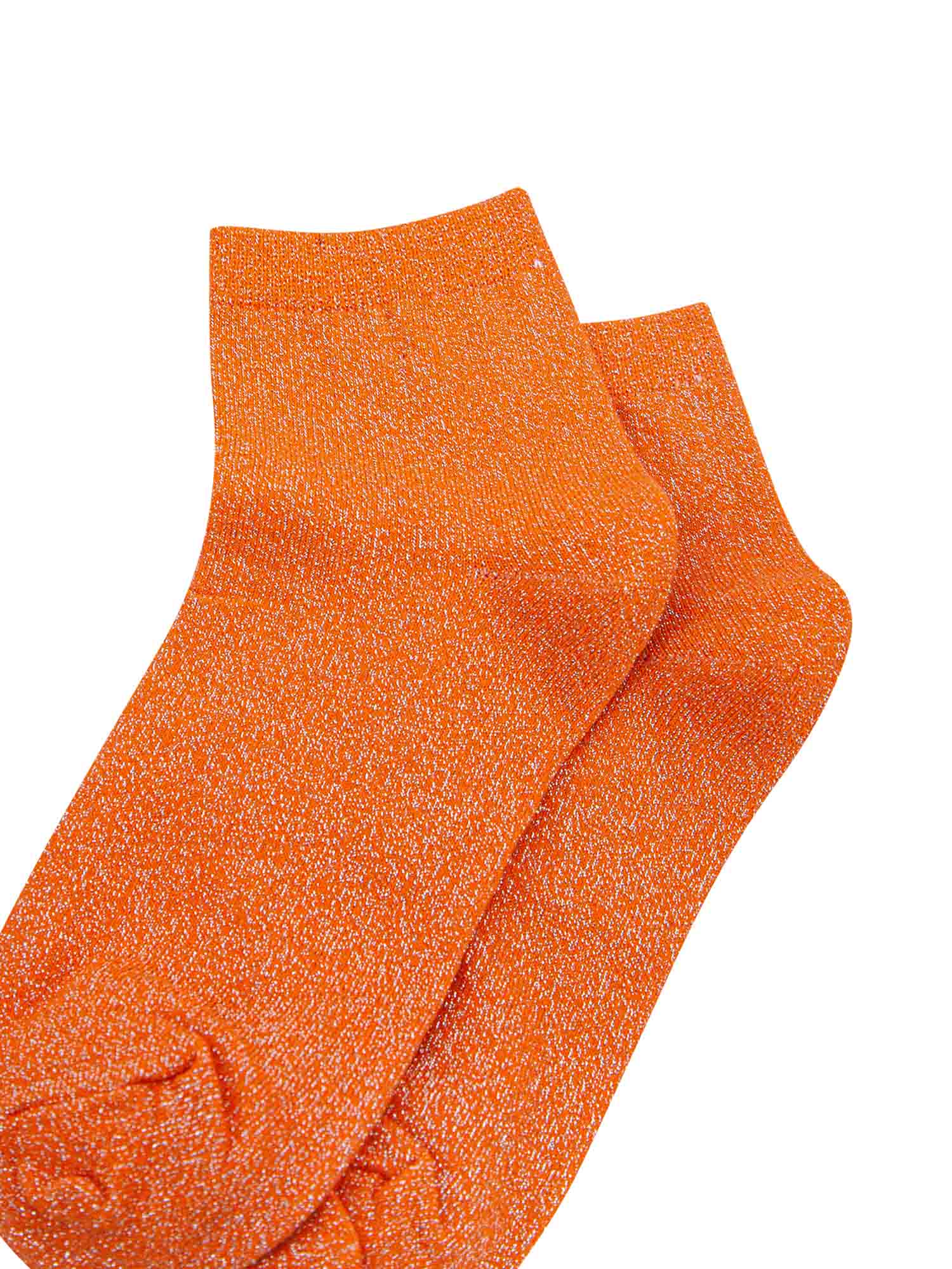 close up of the sparkly glitter effect on the orange anklet socks

