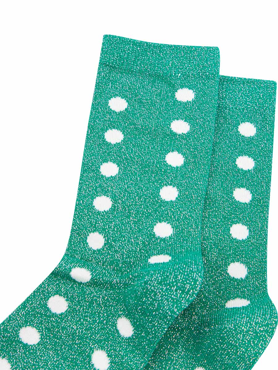 green and white polka dot ankle socks with an all over silver glitter effect