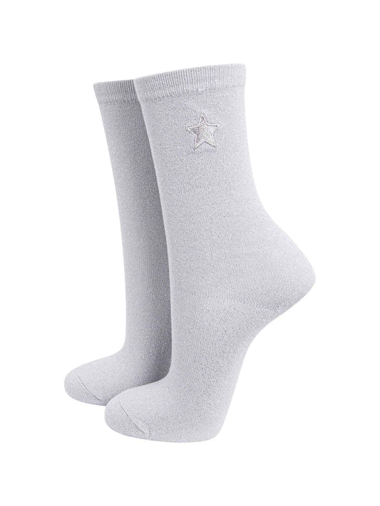 white and silver glitter socks with an embroidered star on the ankle