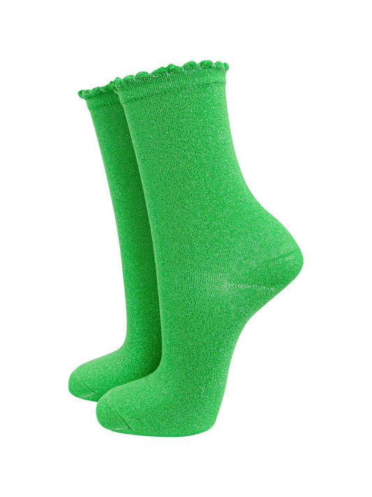 apple green coloured ankle socks with an all over glitter sparkle and scalloped cuffs