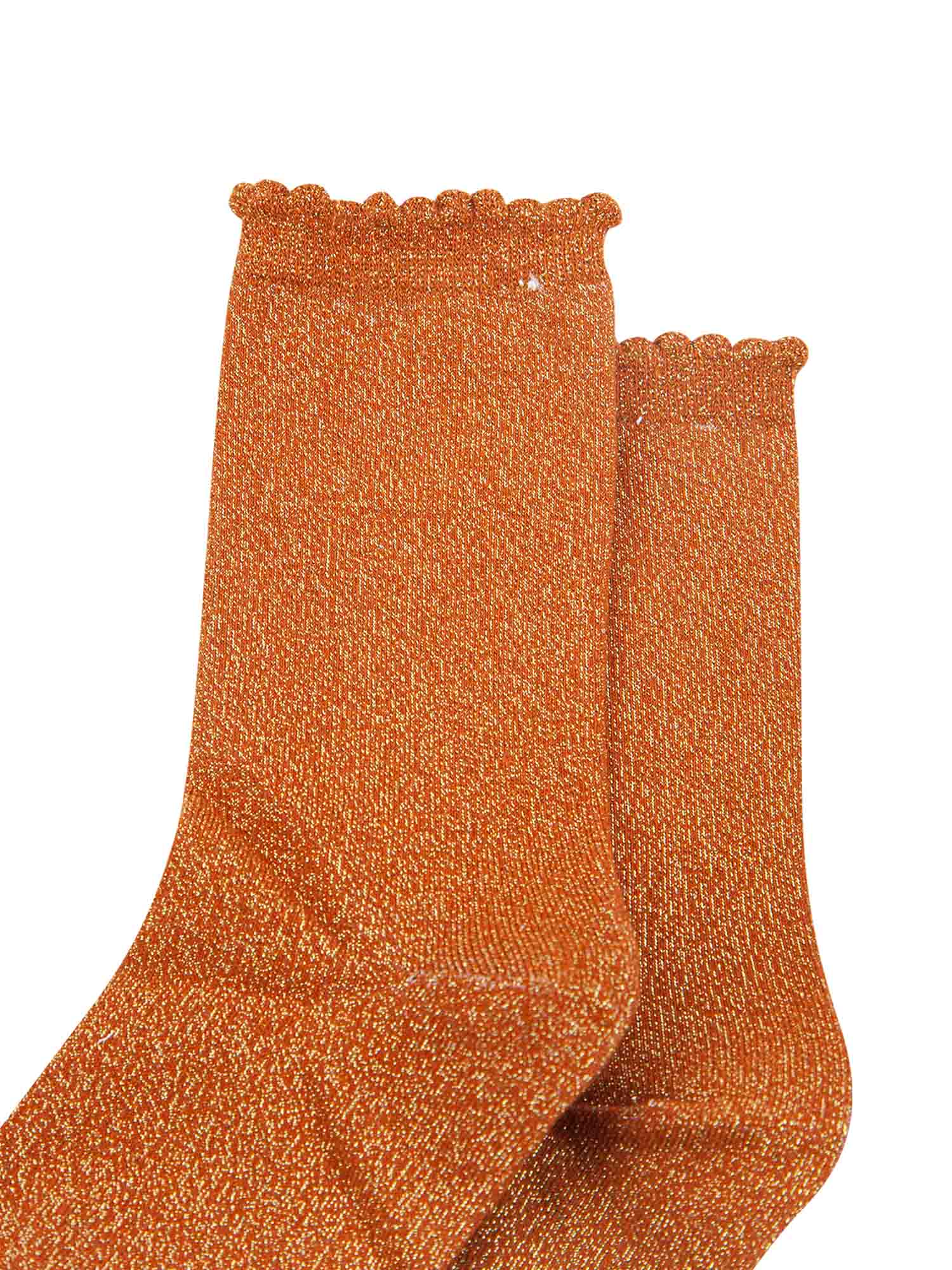 burnt orange cotton socks with an all over silver glitter shimmer, the socks have a scalloped cuff edge