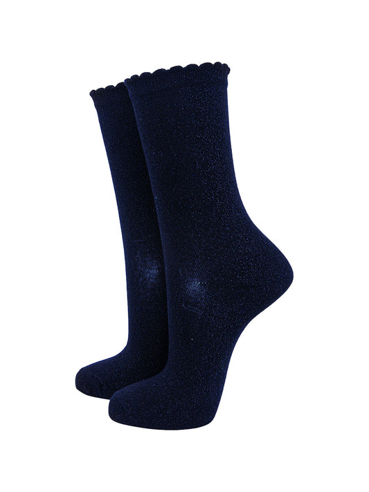 black cotton socks with an all over royal blue glitter shimmer, the socks have a scalloped cuff edge