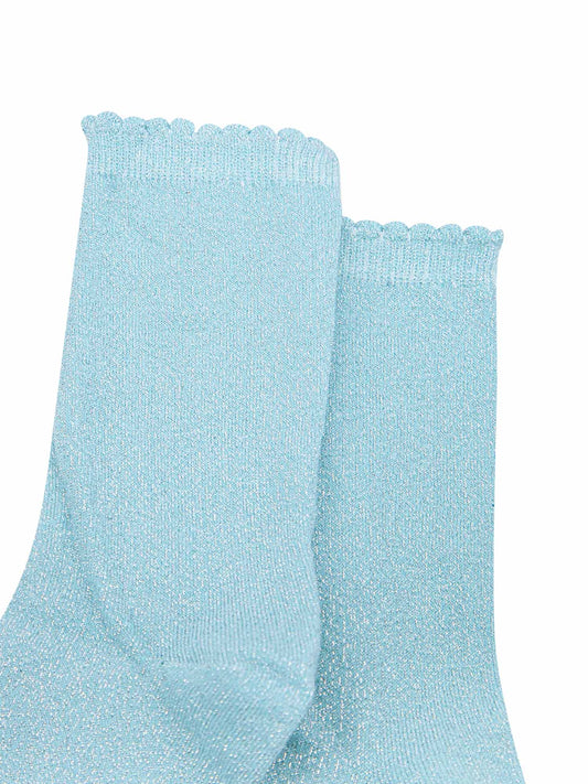 close up of the duck egg blue and silver glitter socks and scalloped cuffs