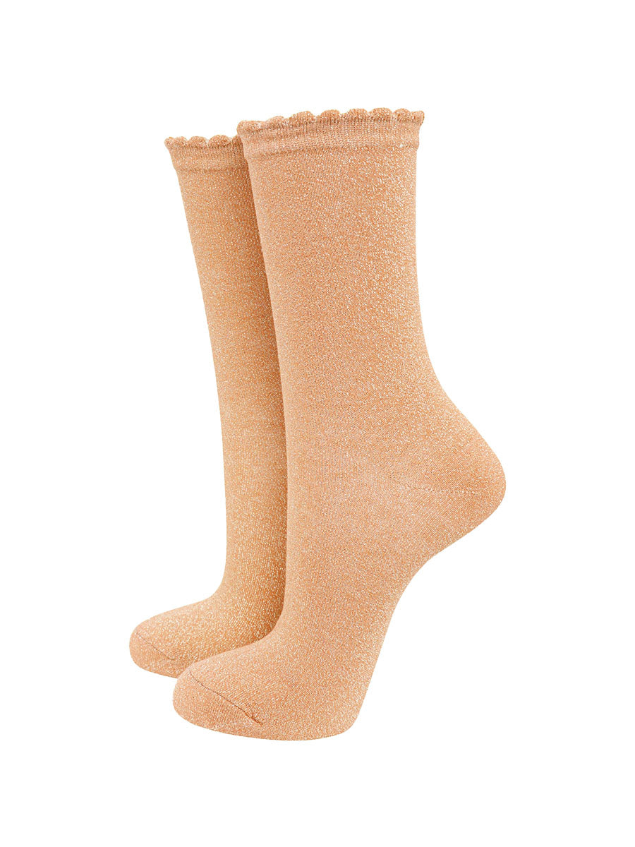 gold cotton socks with an all over glitter shimmer, the socks have a scalloped cuff edge
