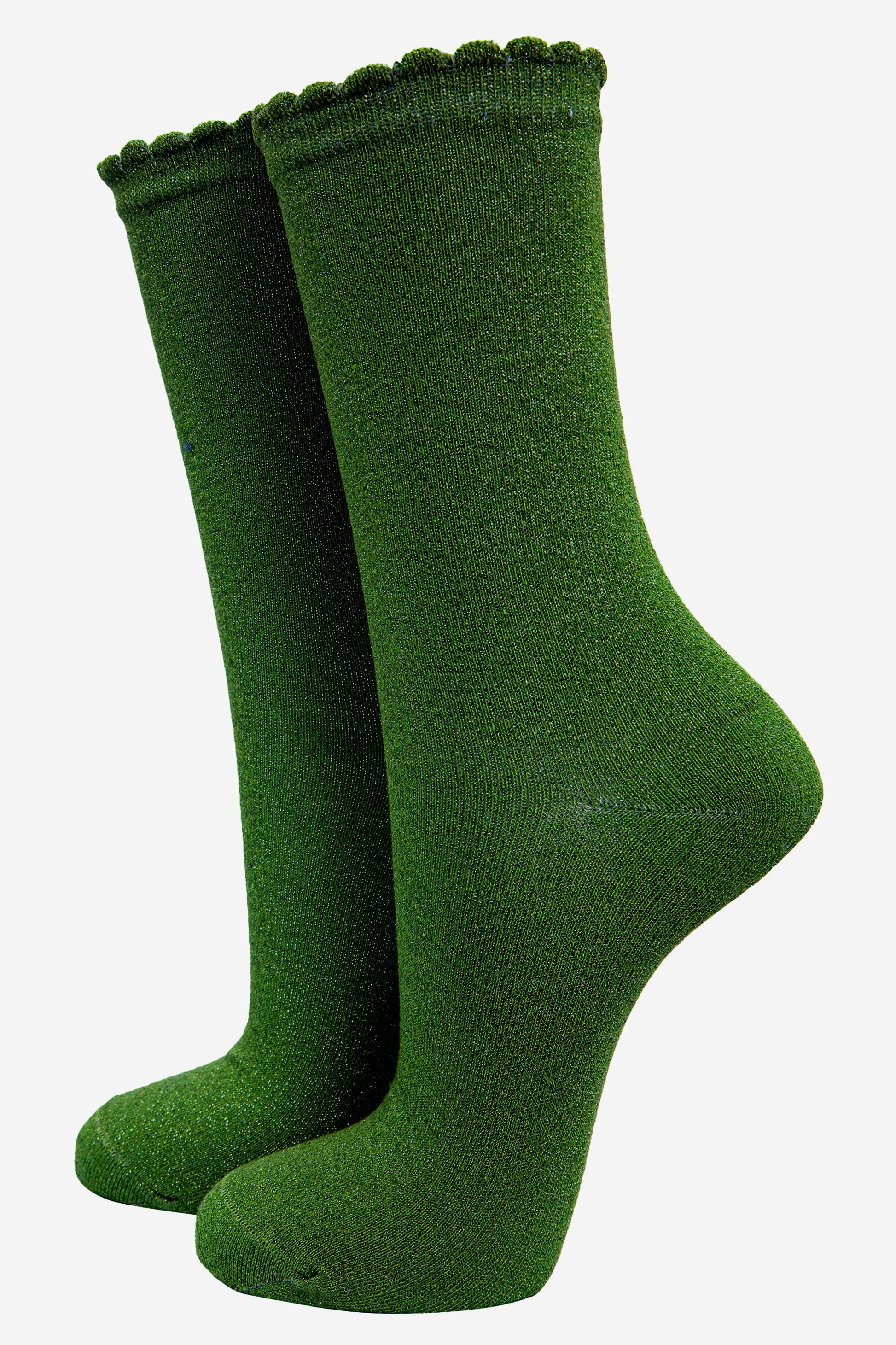 green cotton socks with an all over khaki glitter shimmer, the socks have a scalloped cuff edge