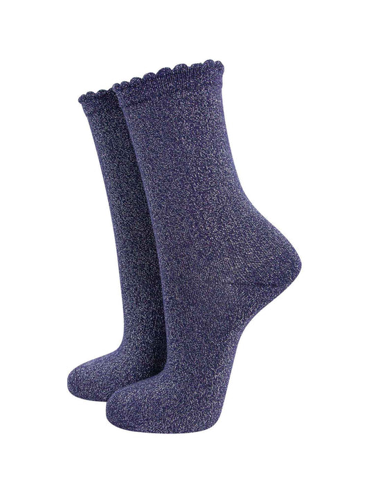 navy blue cotton socks with an all over silver glitter shimmer, the socks have a scalloped cuff edge