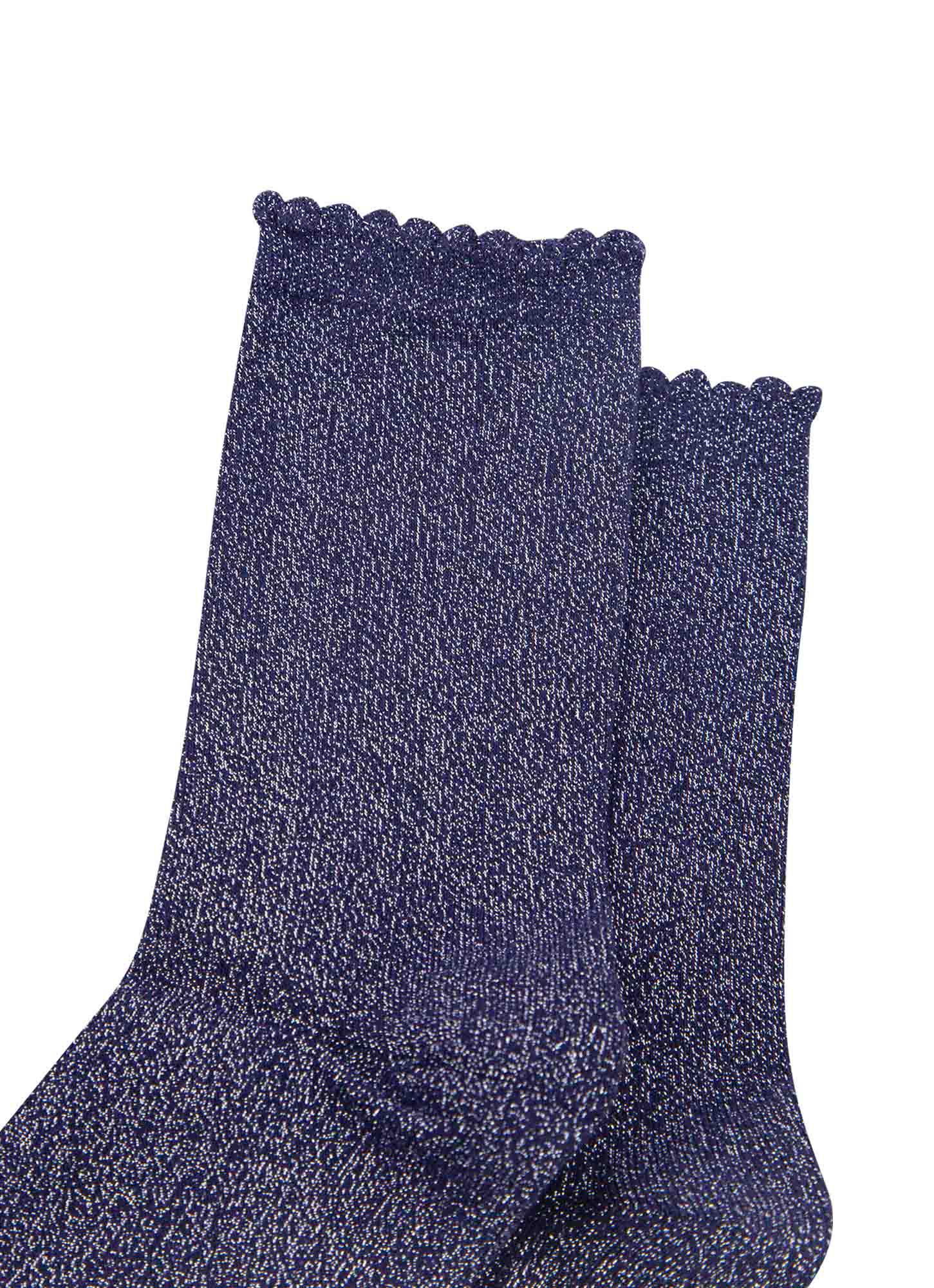 close up of the navy blue and silver glitter socks and scalloped cuffs
