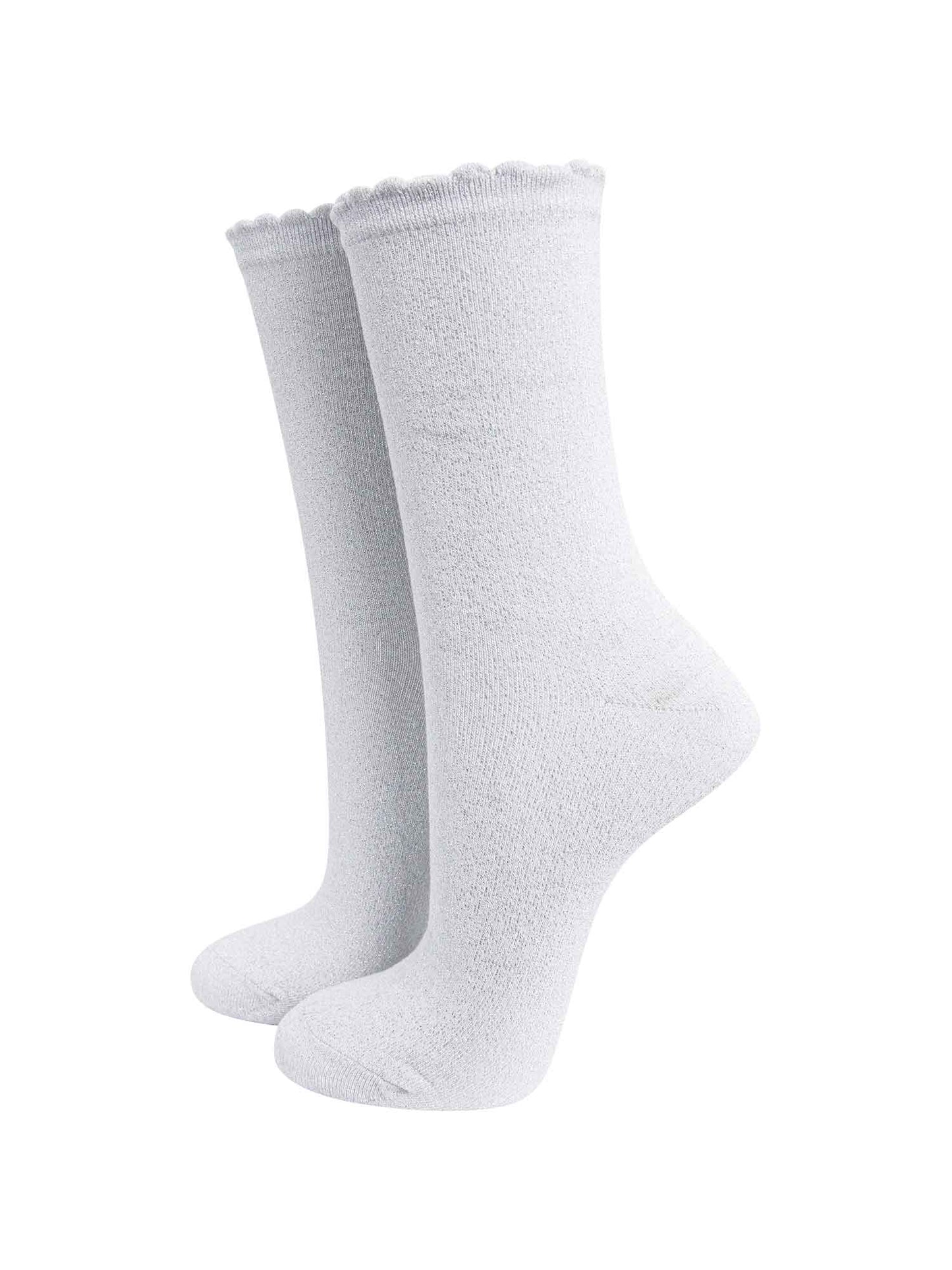 white ankle socks with an all over silver glitter shimmer and scalloped cuffs
