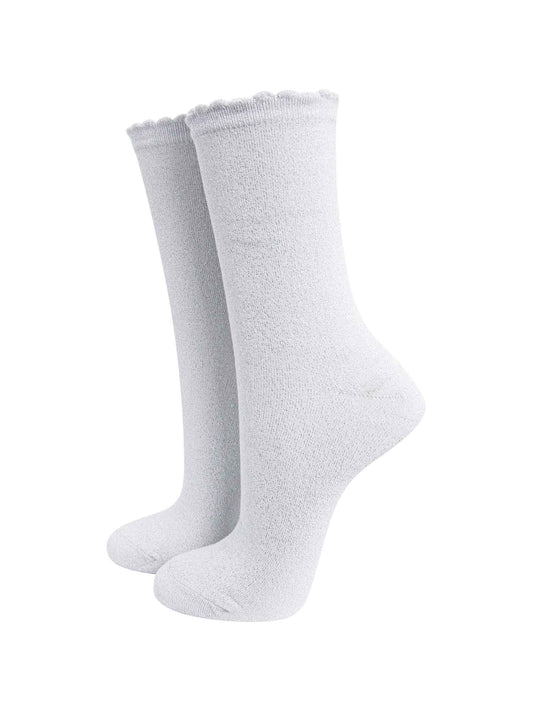 white ankle socks with an all over silver glitter shimmer and scalloped cuffs
