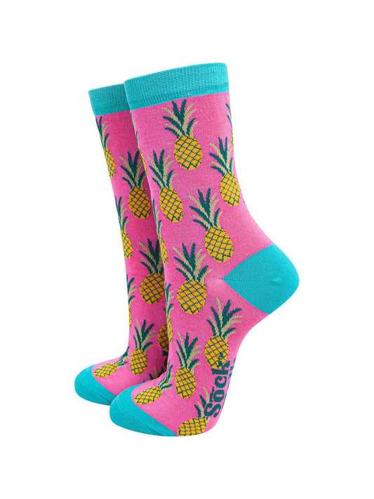 pink ankle socks, blue toe, heel and trim with all over yellow pineapple print