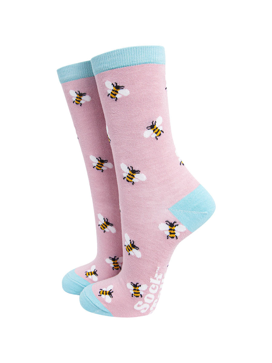 light pink ankle socks with an all over bee print