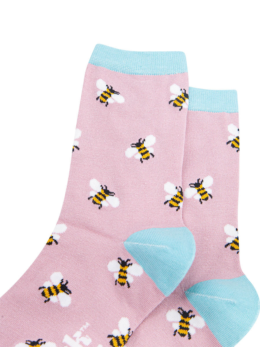 pink socks with blue, heel, toe and trim with bumblebees on them
