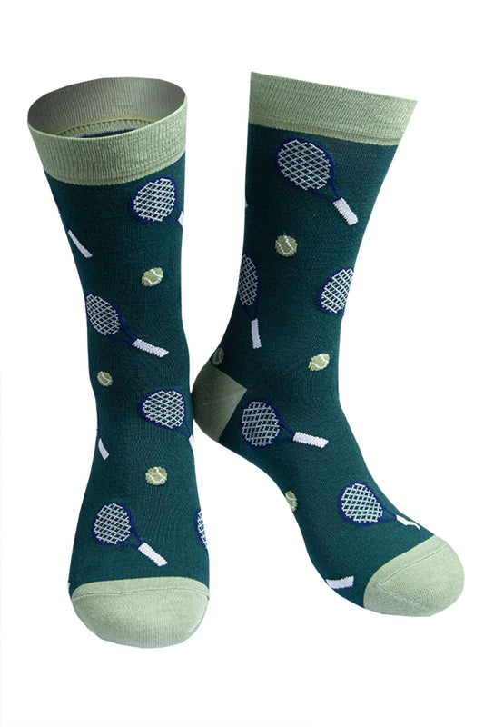 green bamboo dress socks with a pattern of tennis racquets and tennis balls