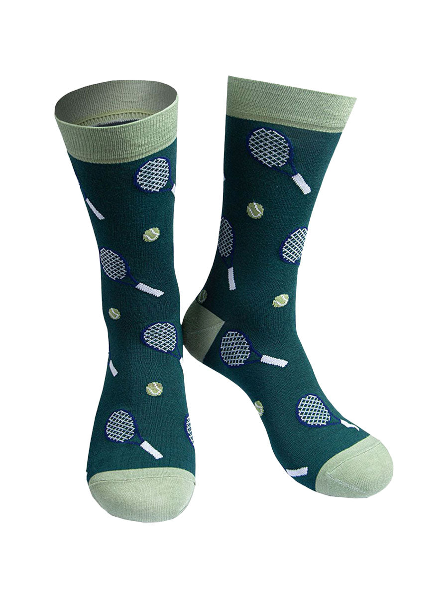 green bamboo dress socks with a pattern of tennis racquets and tennis balls