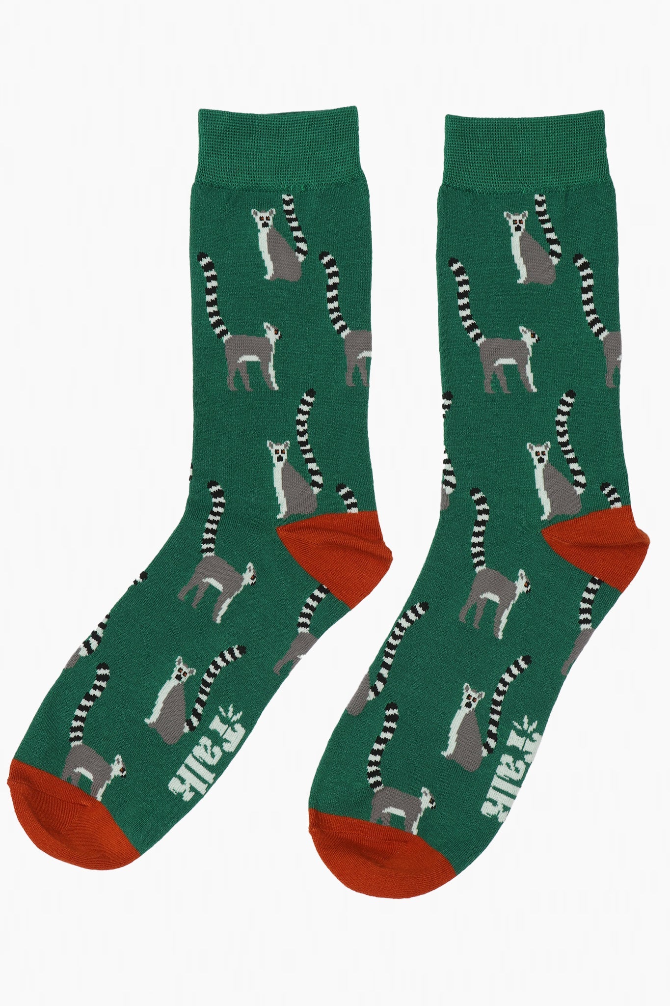 green and orange bamboo novelty socks with an all over pattern of lemurs