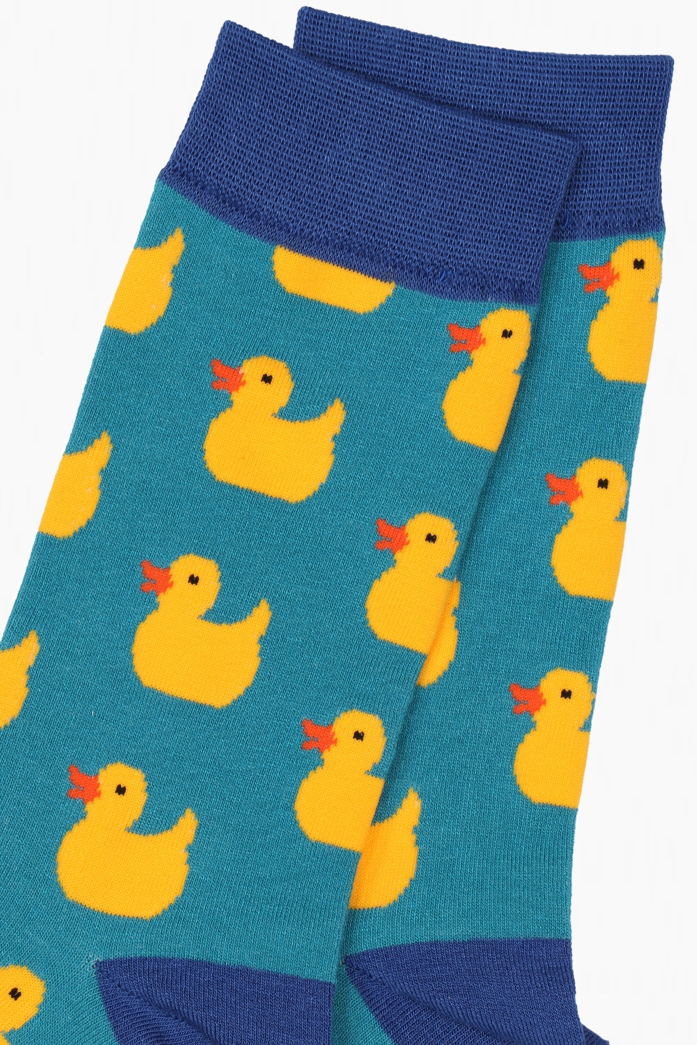 close up of the yellow rubber ducks on the mens novelty bamboo socks