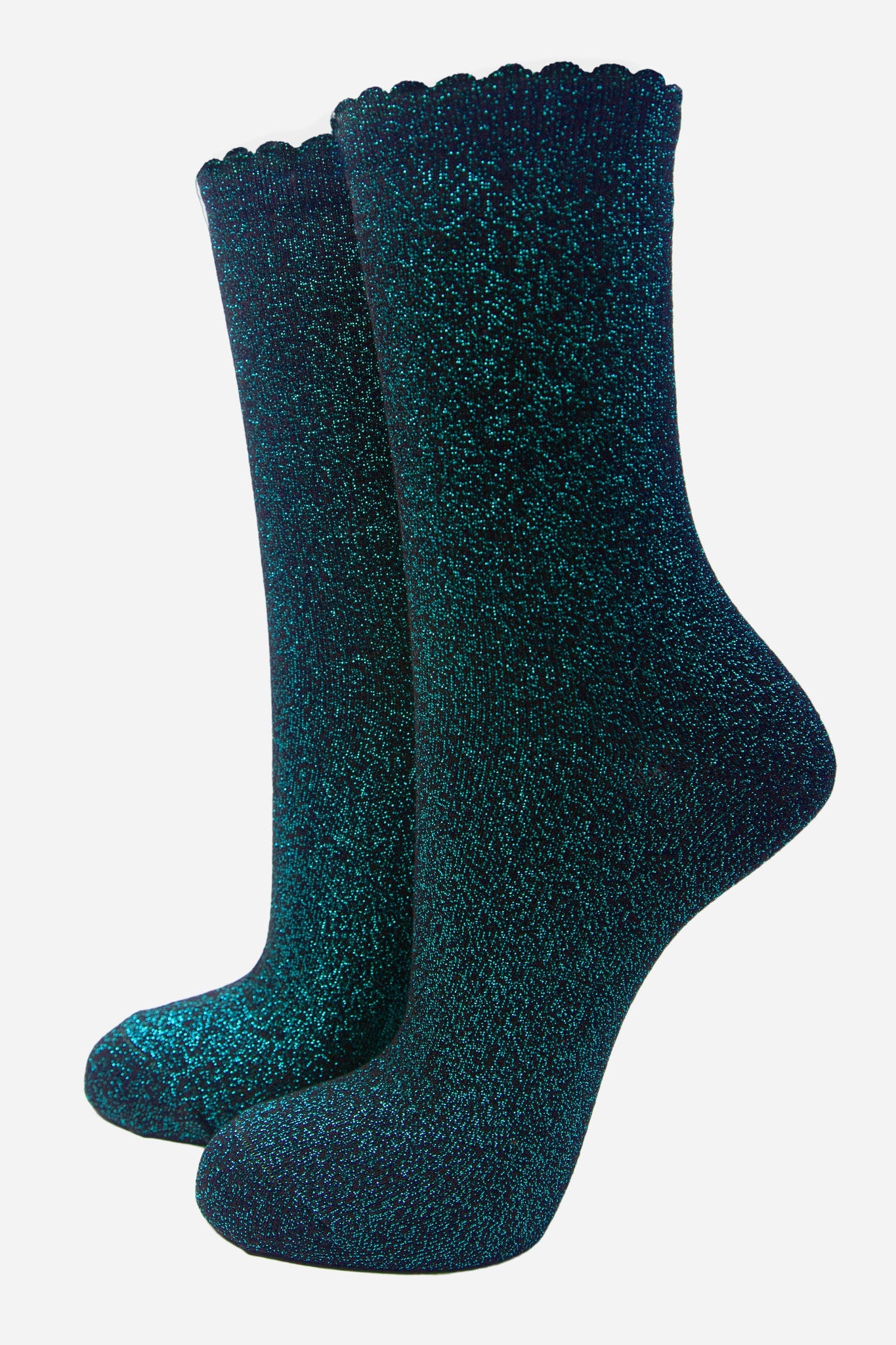 black cotton socks with an all over turquoise glitter shimmer, the socks have a scalloped cuff edge