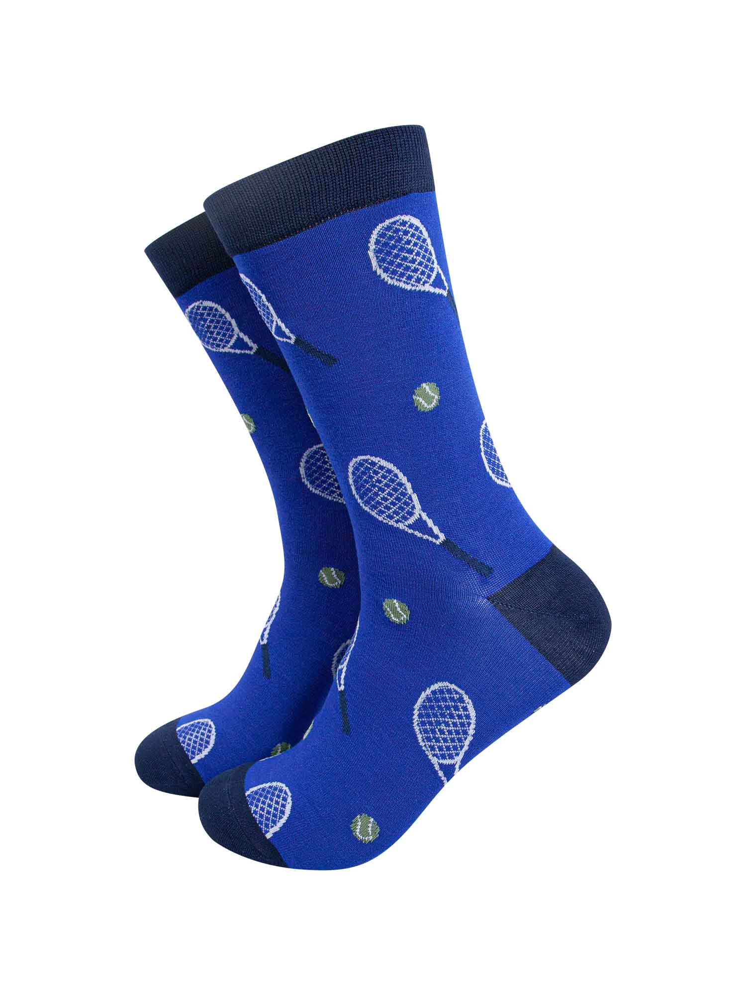 blue bamboo novelty socks with an all over pattern of tennis raquets and tennis balls