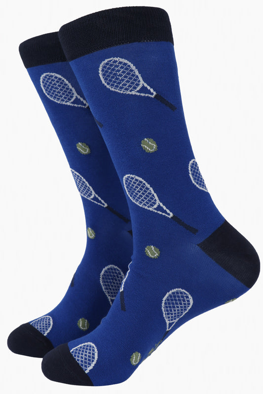 blue bamboo novelty socks with an all over pattern of tennis raquets and tennis balls