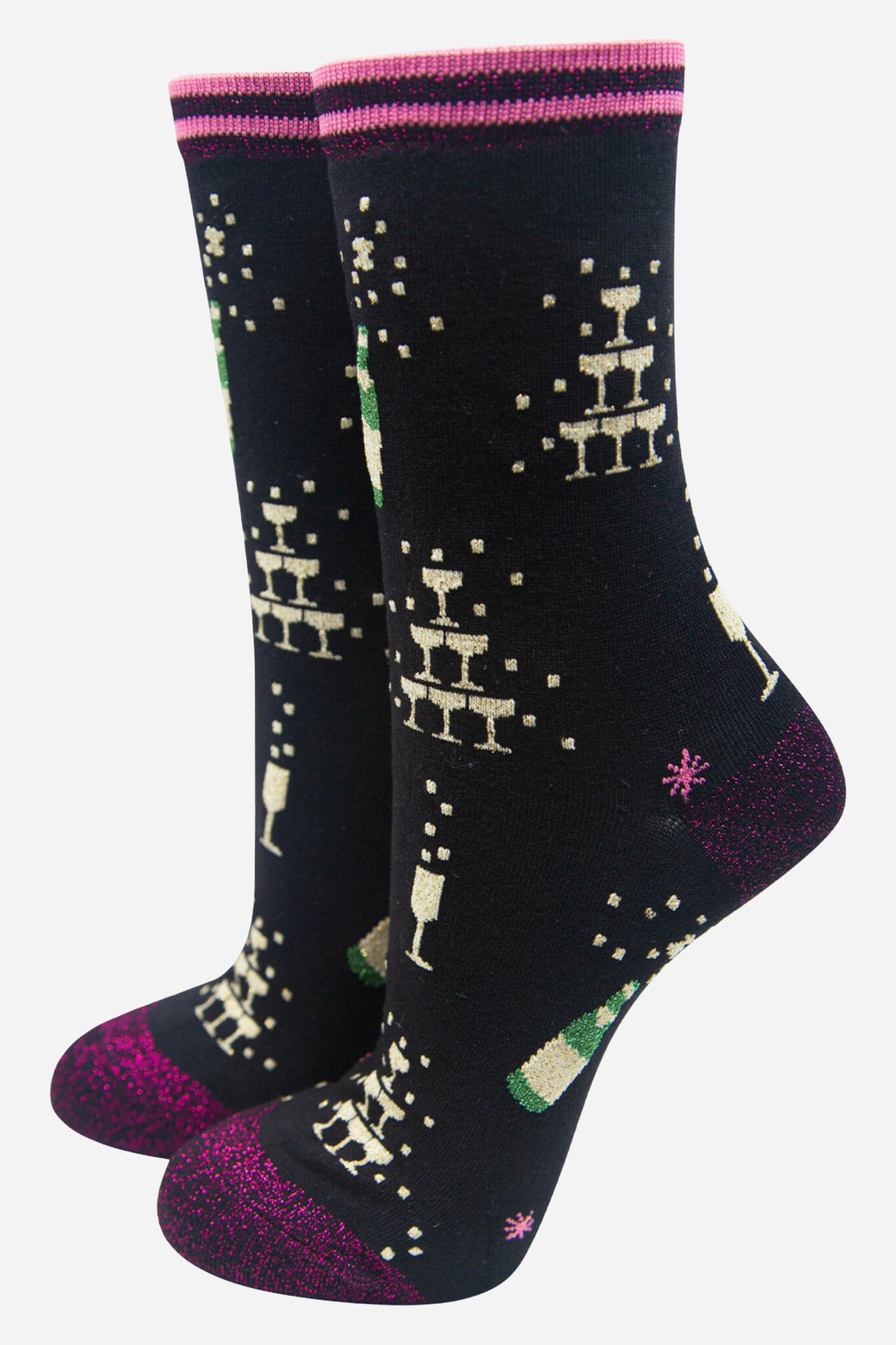 black bamboo socks with gold glitter champagne glasses and bottles, the socks have a pink glitter heel, toe and cuff
