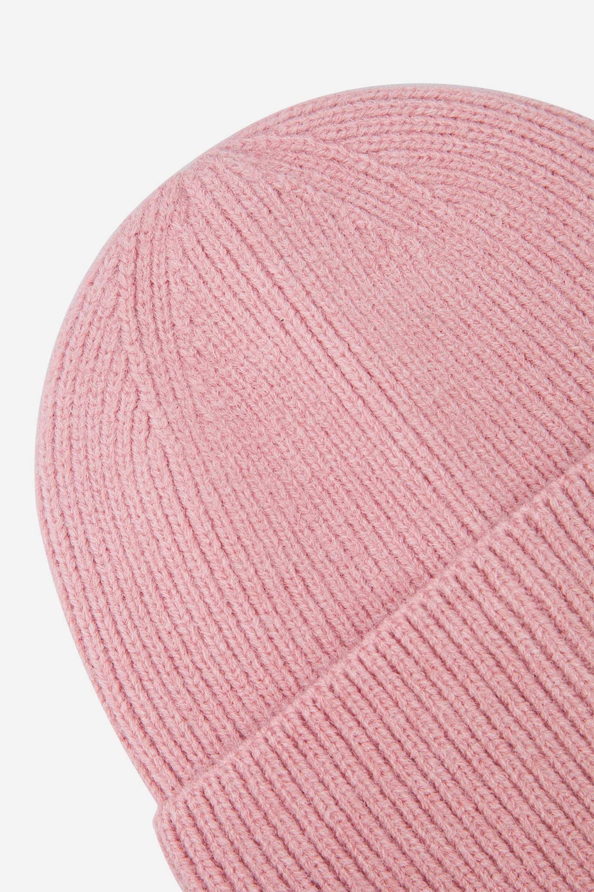 noelle-light-pink-ribbed-beanie-hat-close-up-knitted