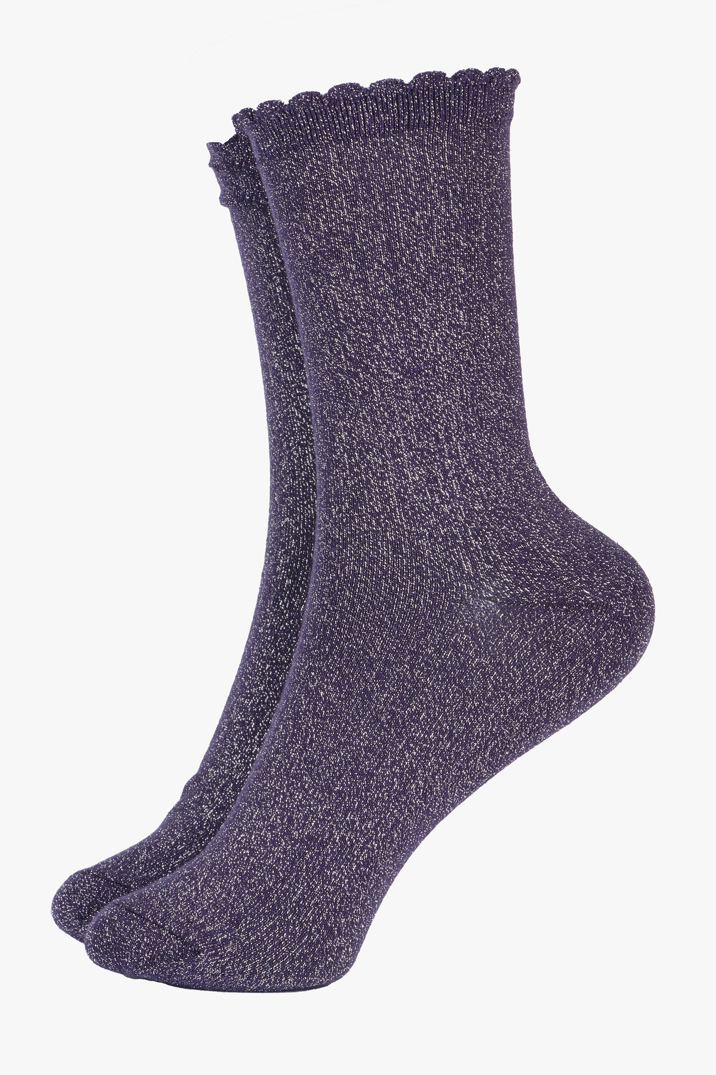 navy blue cotton socks with an all over silver glitter shimmer, the socks have a scalloped cuff edge