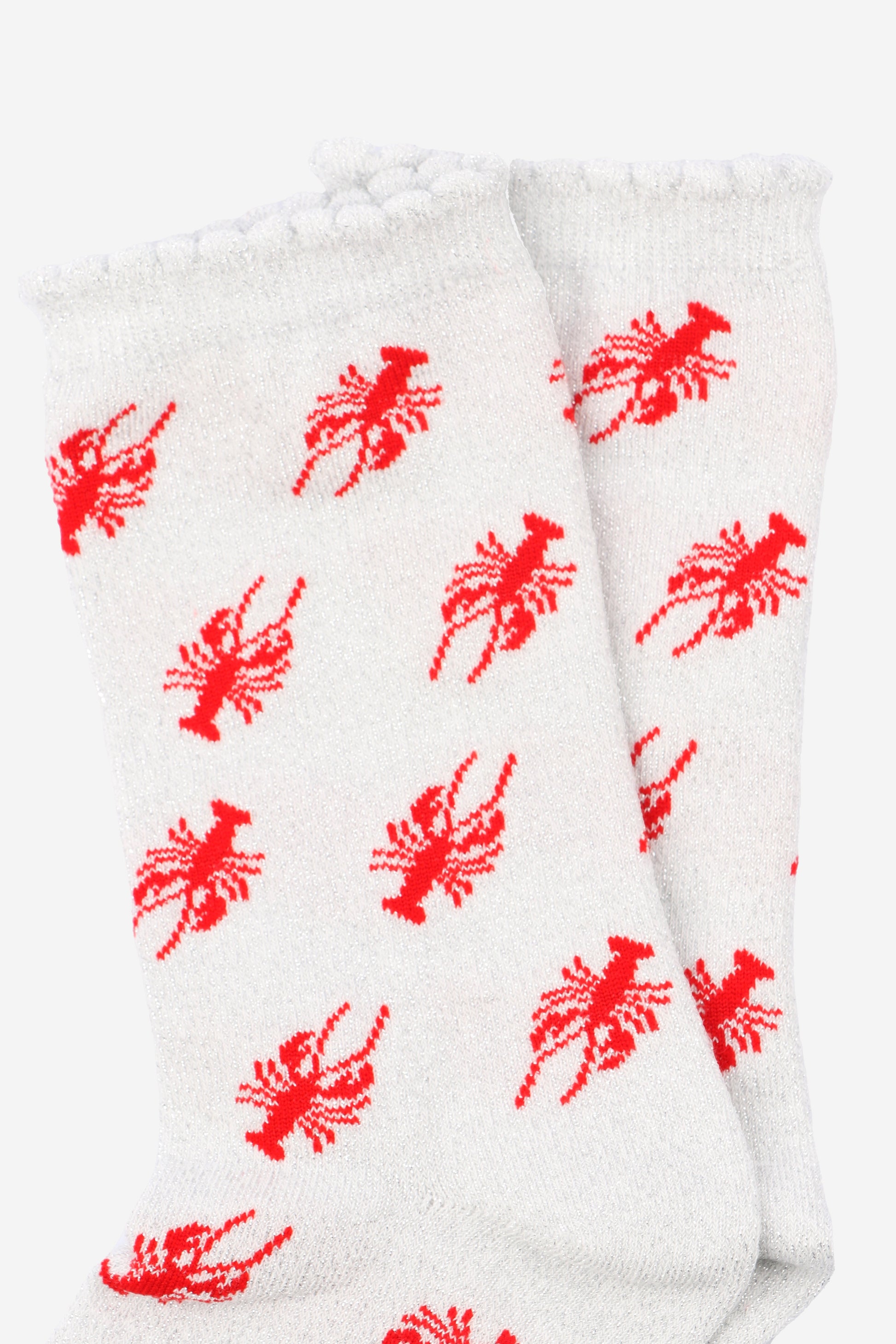 close up of the red lobster pattern on the glitter ankle socks