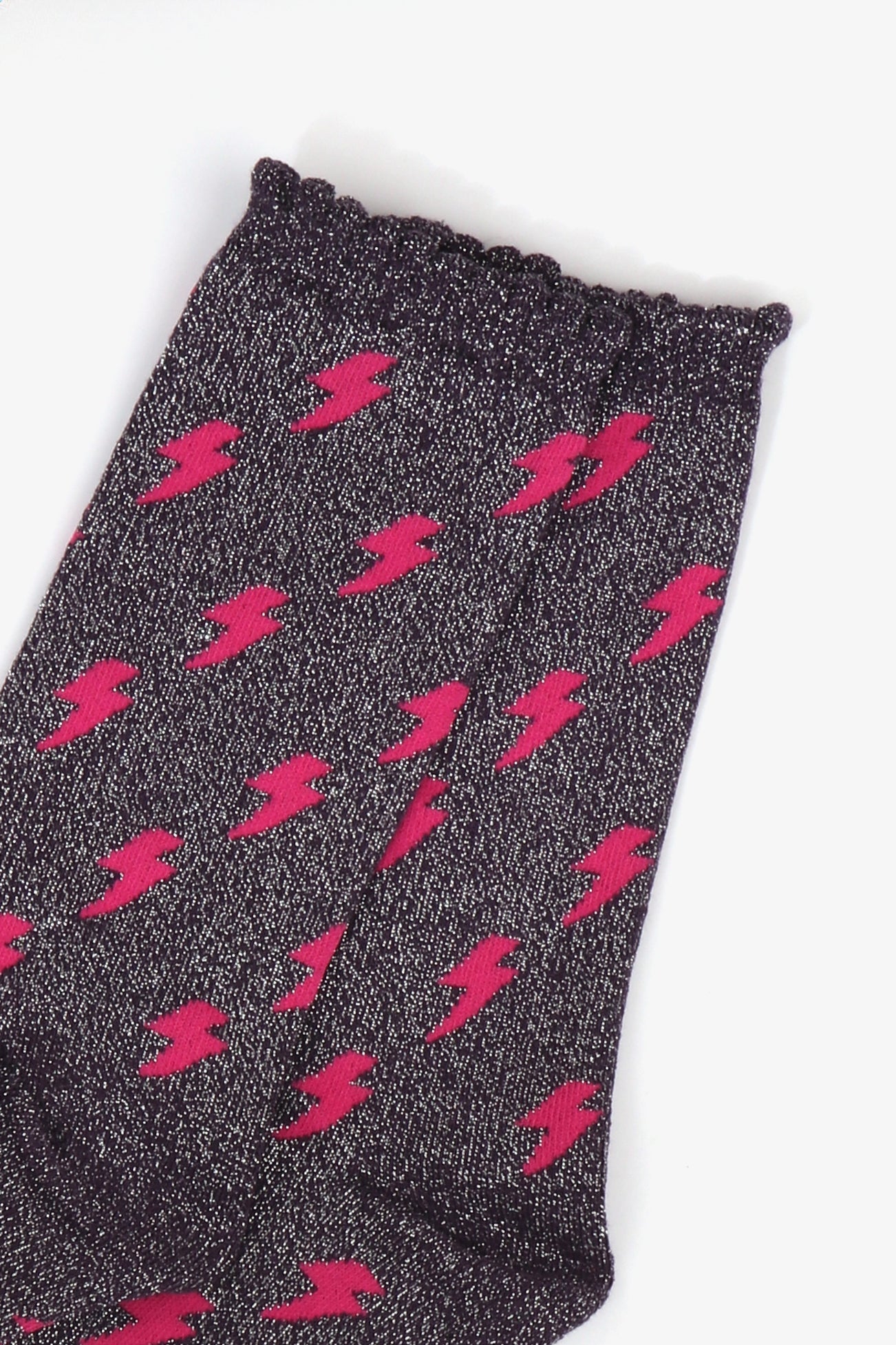 navy blue sparkly glitter socks with an all over pattern of pink lighting bolts