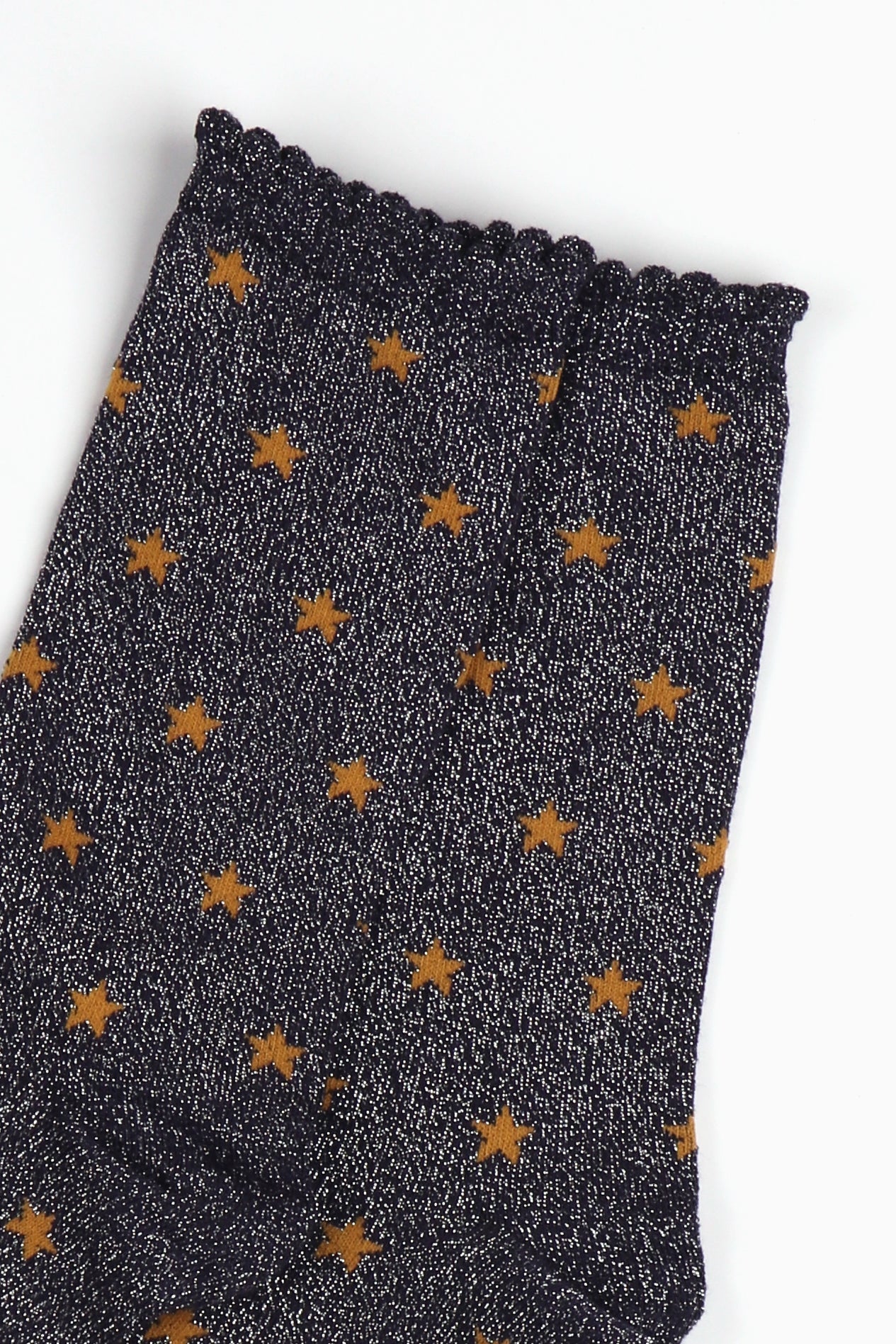 navy blue sparkly ankle socks with an all over silver glitter shimmer and an all over orange star print pattern