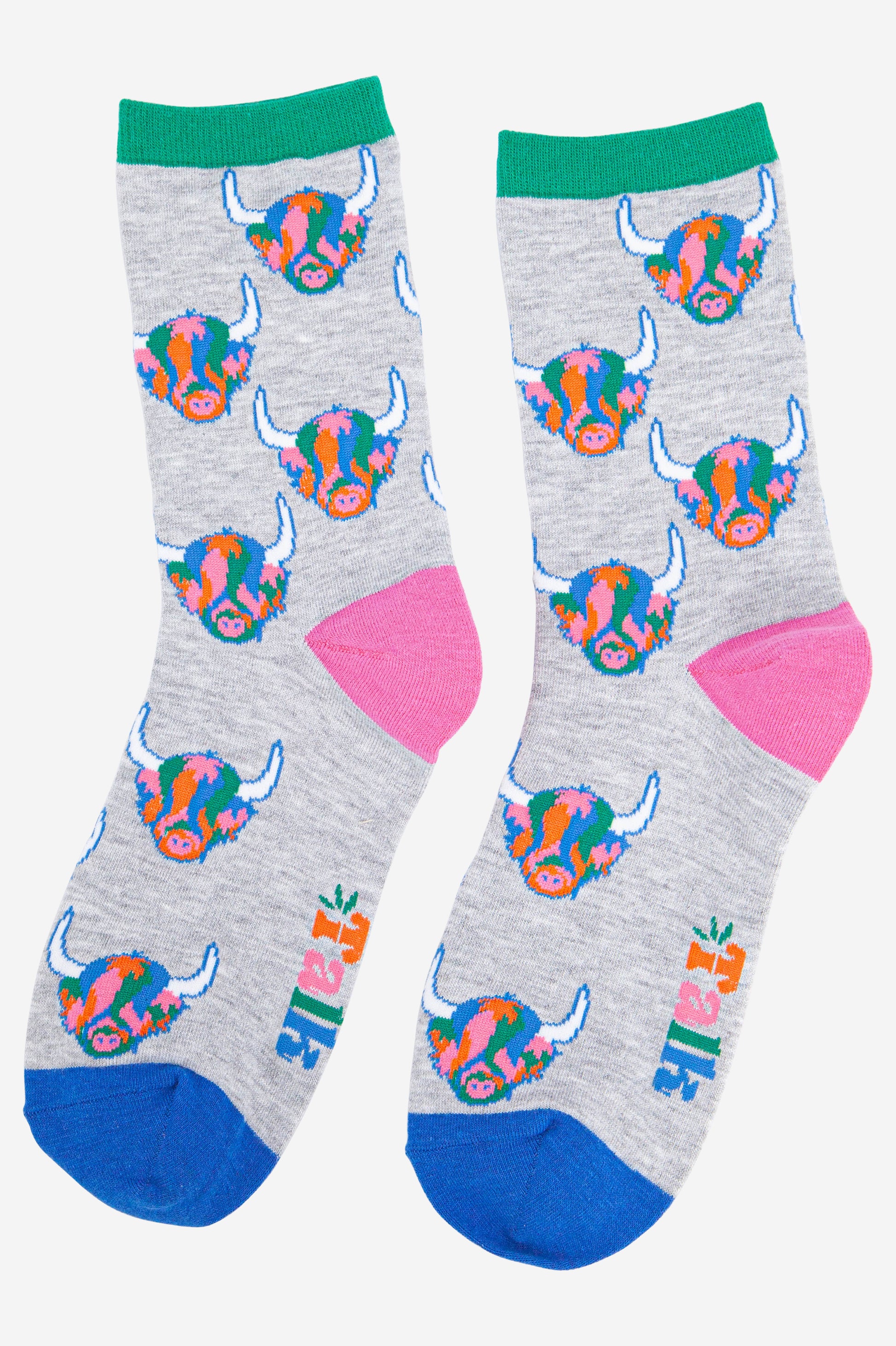 grey bamboo ankle socks with an all over pattern of multicoloured rainbow highland cows